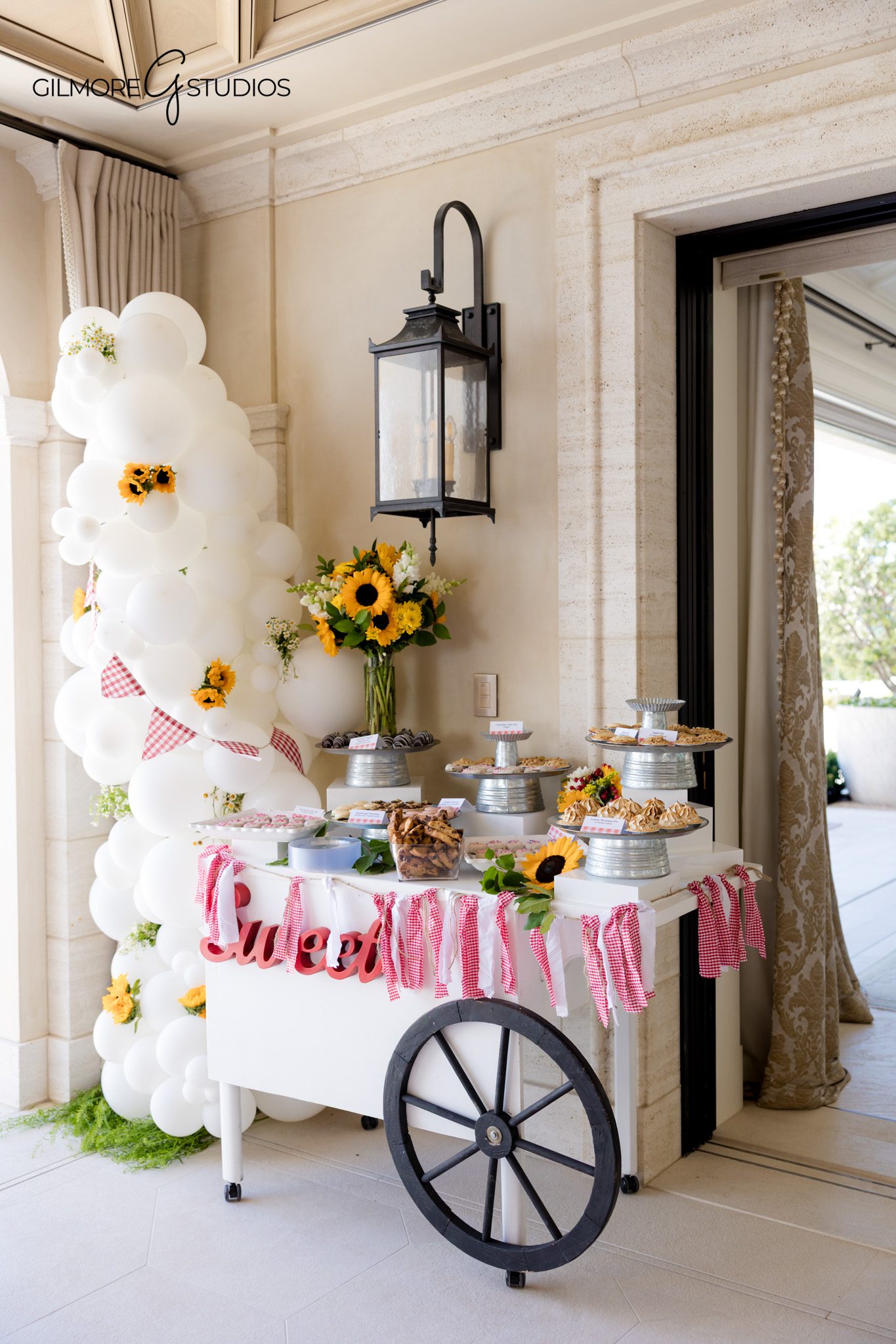 Newport Beach event photographer photographing BabyQ baby shower decorations
Private estate baby shower in Newport Beach with styled tables and florals