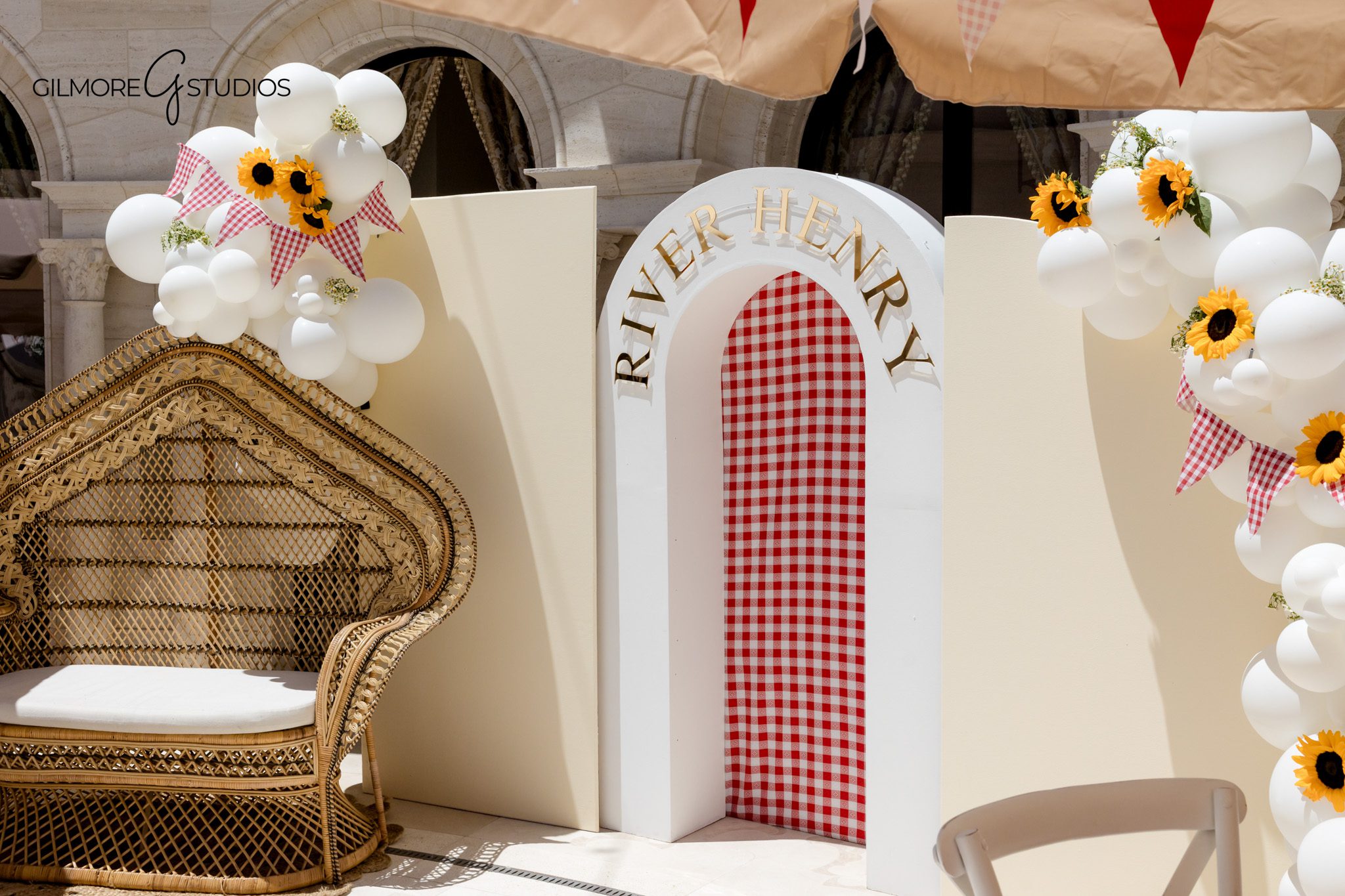 Custom baby shower signage photographed during a BabyQ theme celebration