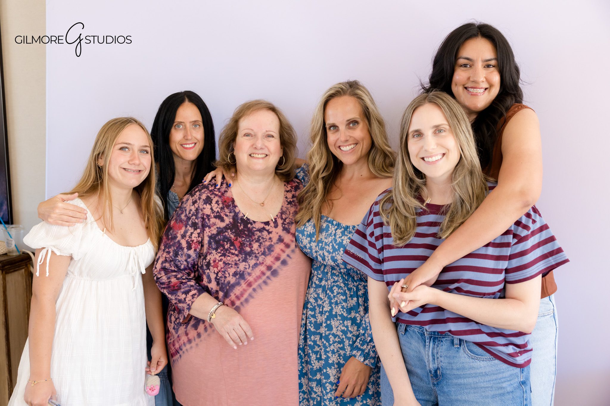 Grandparents celebrating with mom-to-be at a Newport Beach baby shower