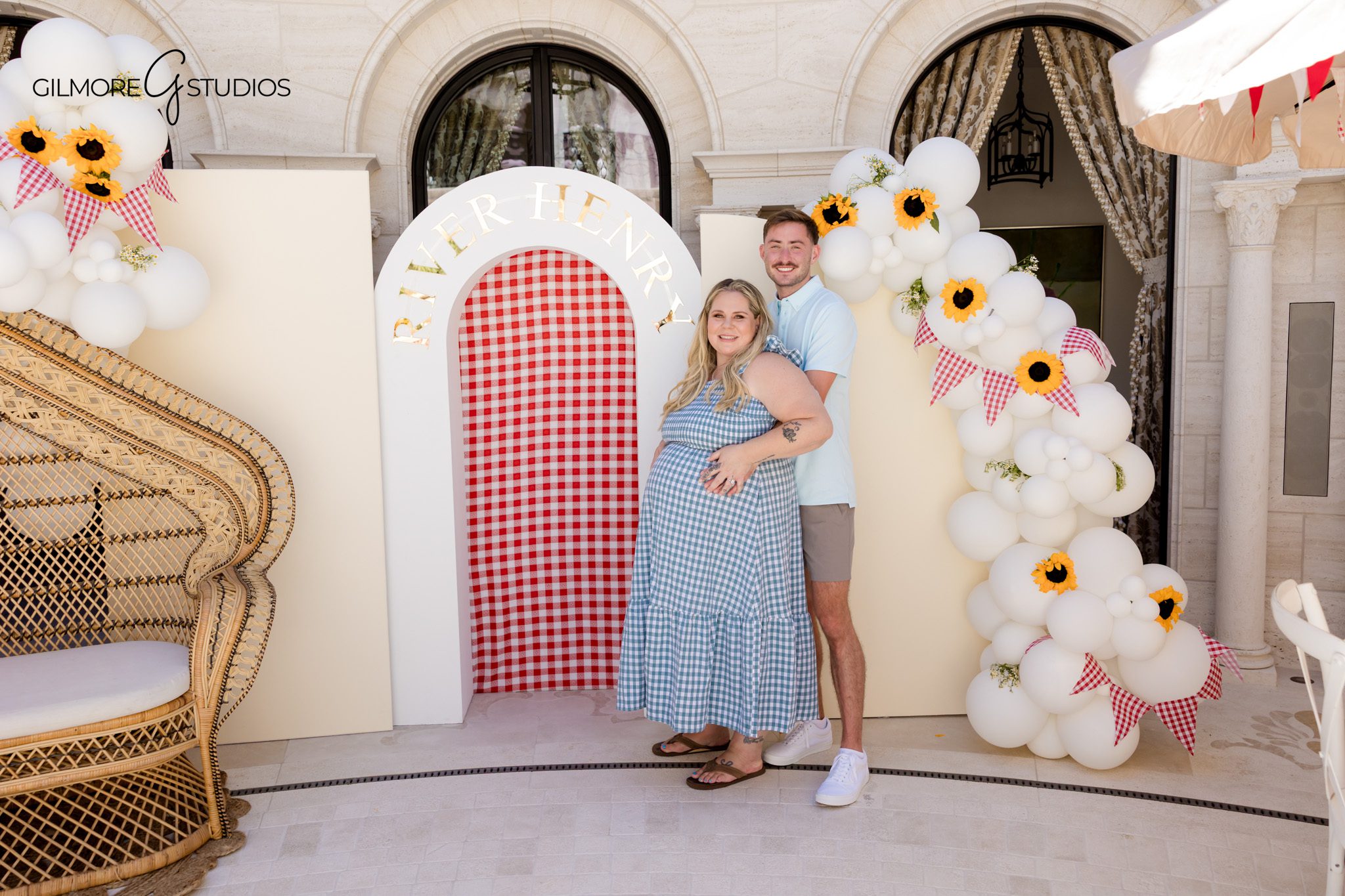 Newport Beach BabyQ shower photographed with warm outdoor event light
Parents-to-be standing together during an Orange County baby shower session