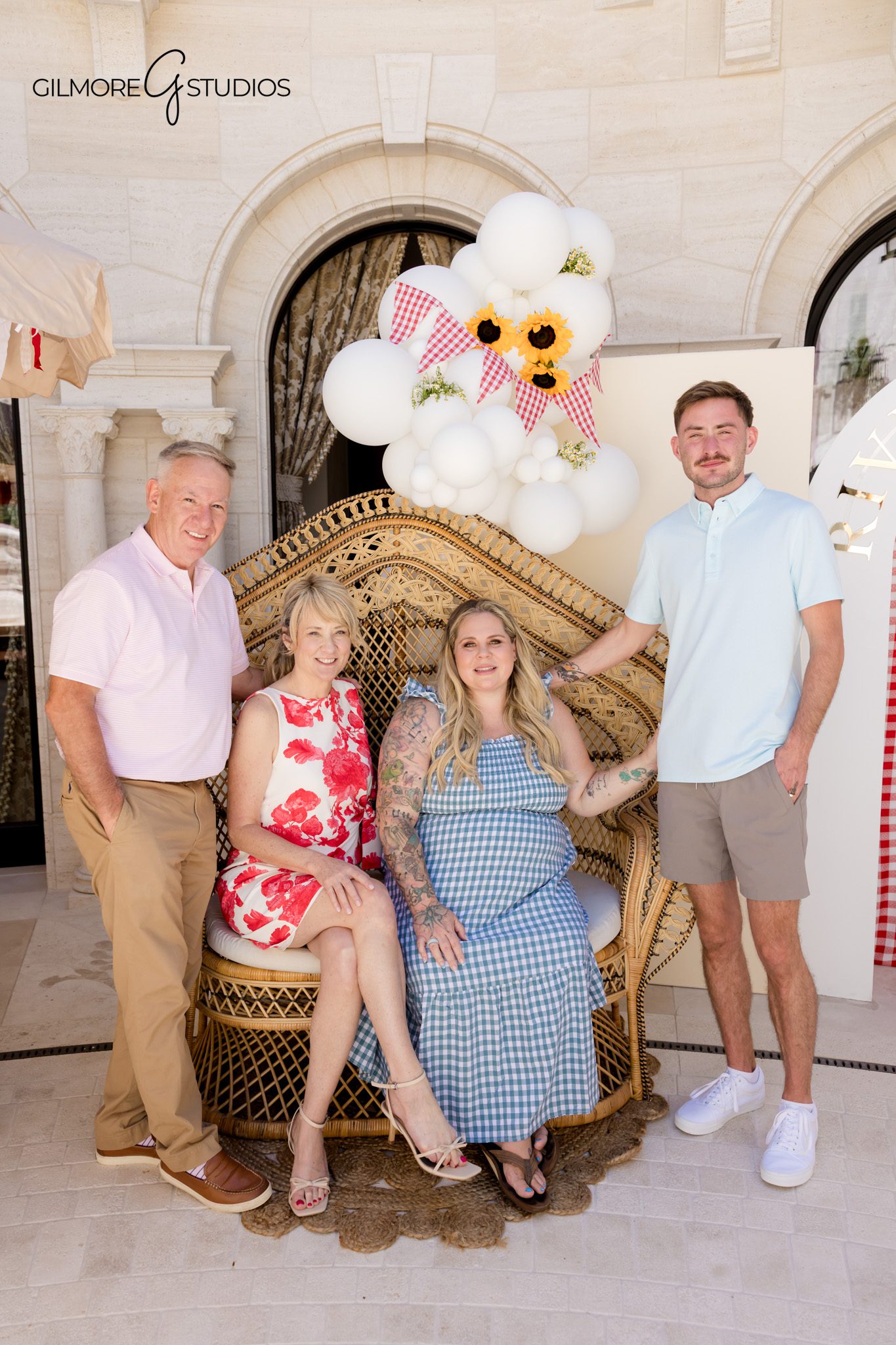 Newport Beach baby shower photographer capturing candid family moments
Sunflower baby shower decor at a BabyQ themed celebration in Orange County