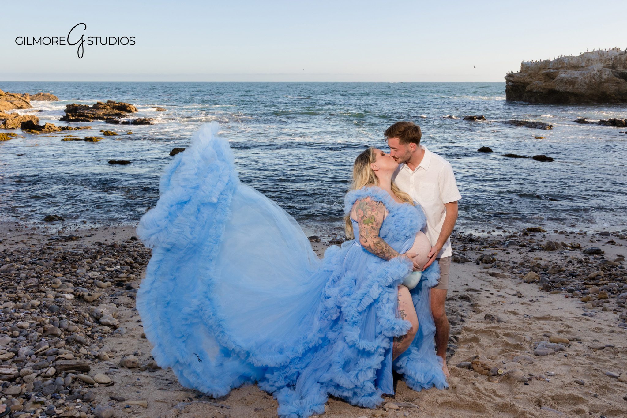 Orange County beach maternity photographer capturing an expecting mom at sunset
Cameo Shores maternity portrait with soft waves and ocean backdrop
