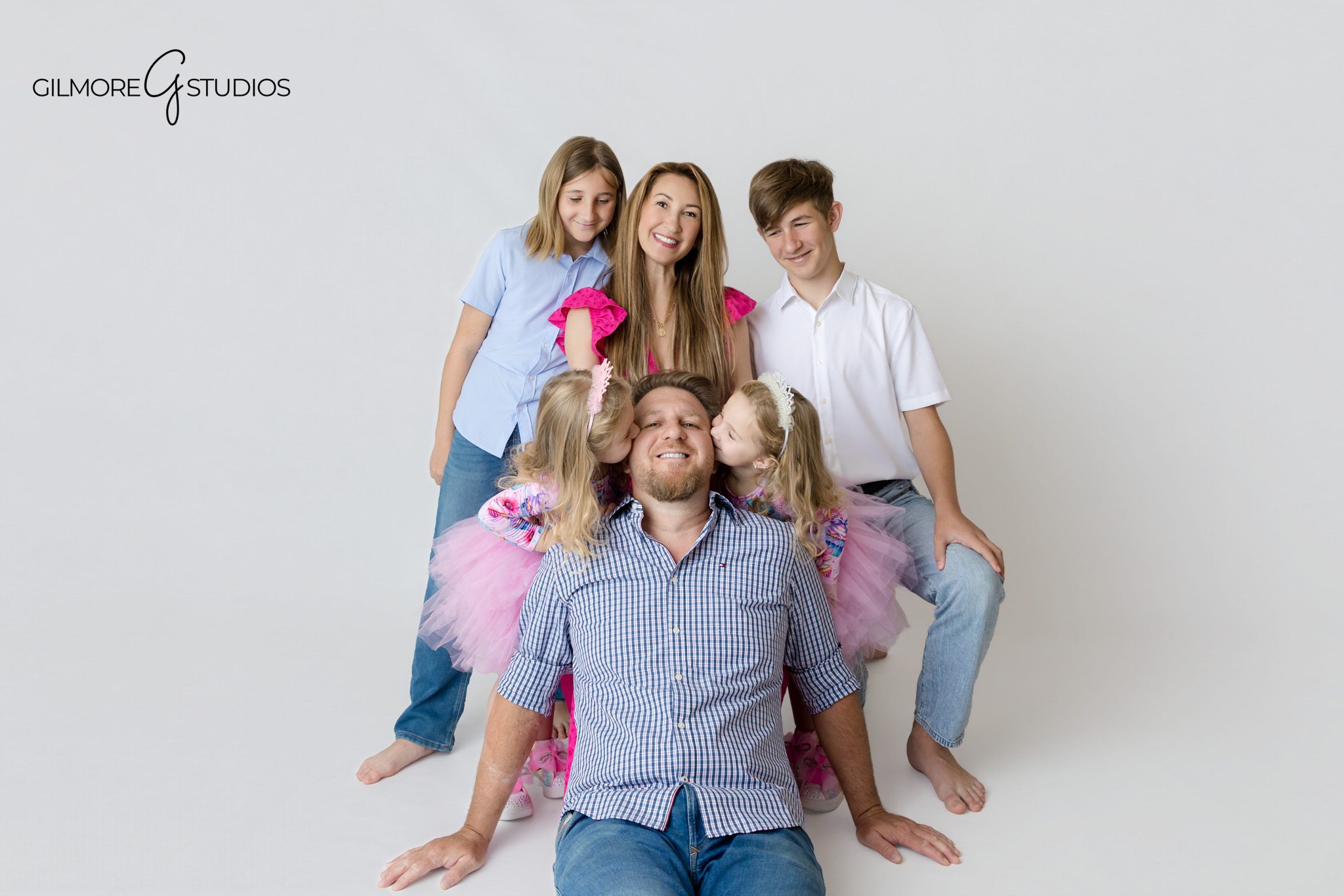Orange County children photographer capturing a unicorn twin birthday session
Twin girls birthday photos with pastel streamers and oversized number balloons