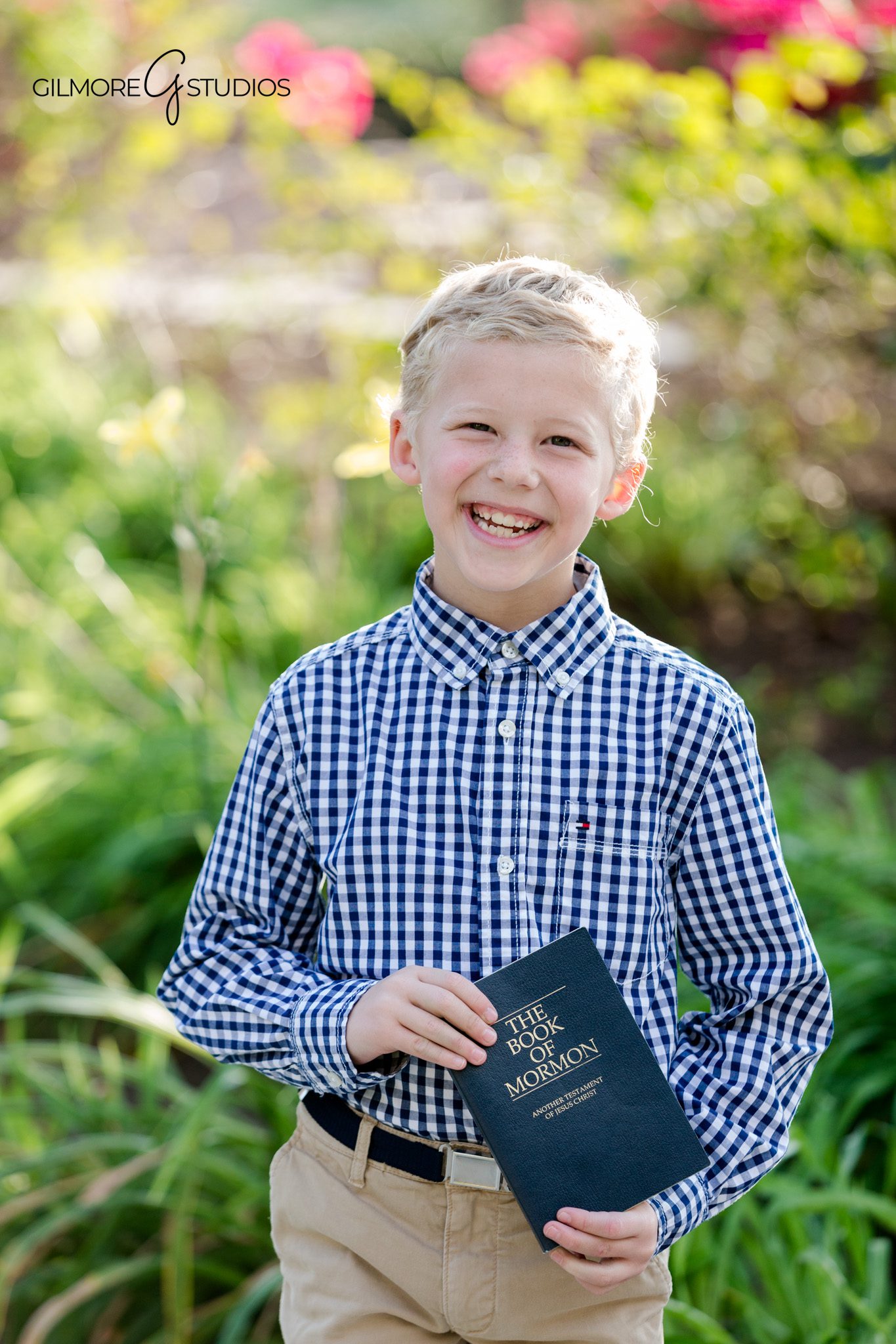 Boy in navy blazer and khaki pants for LDS baptism photos
LDS baptism portrait with temple architecture in the background
