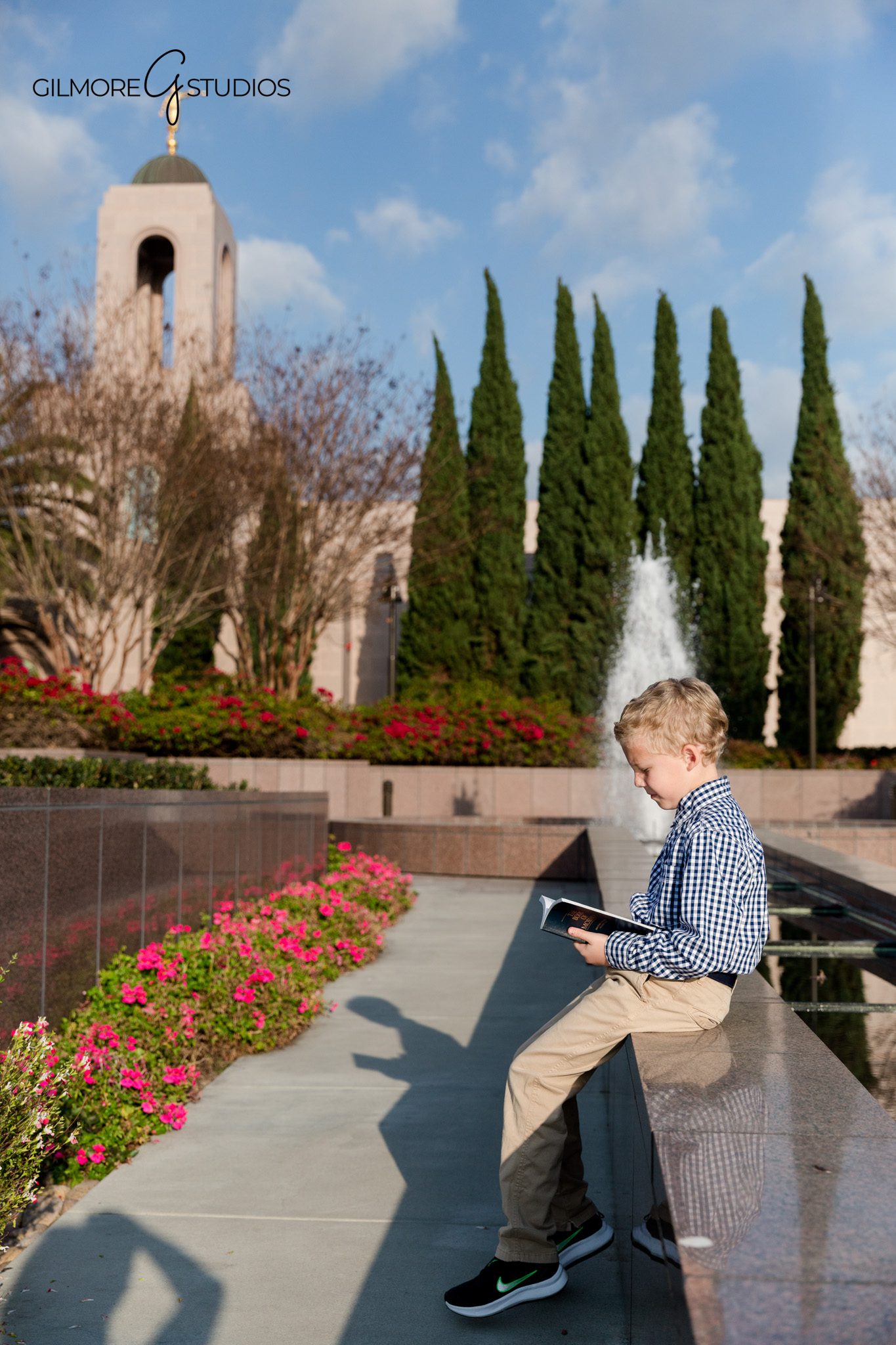 Boy holding scriptures during LDS baptism portrait session
LDS baptism photos for boys at Newport Beach California Temple