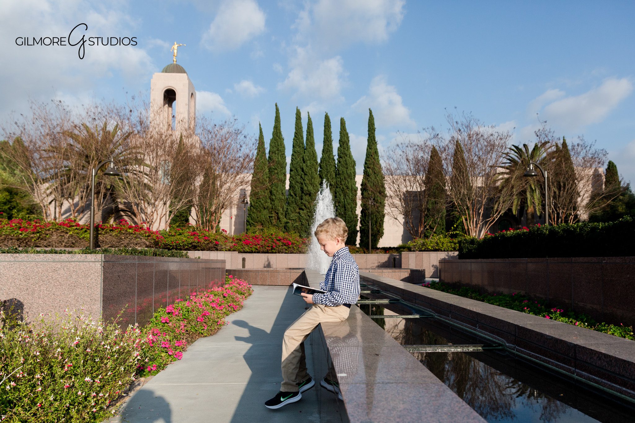 Newport Beach LDS Temple baptism portrait of boy standing in front of temple steps
LDS baptism photos at the Newport Beach California Temple