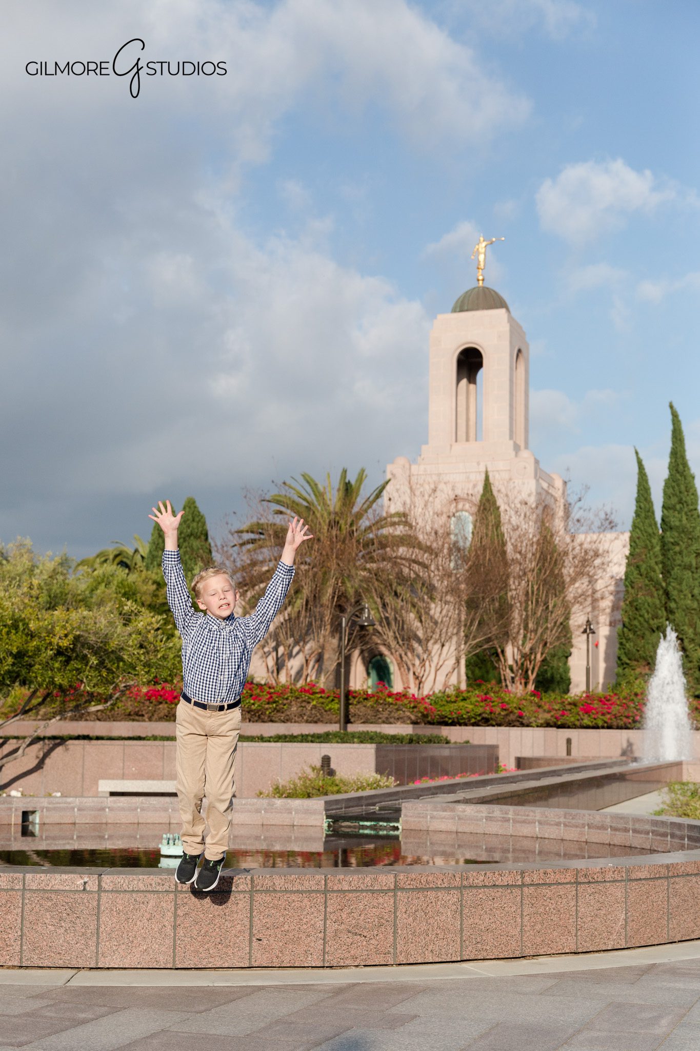 Candid smiling baptism portrait on temple grounds
Newport Beach baptism photographer for LDS families