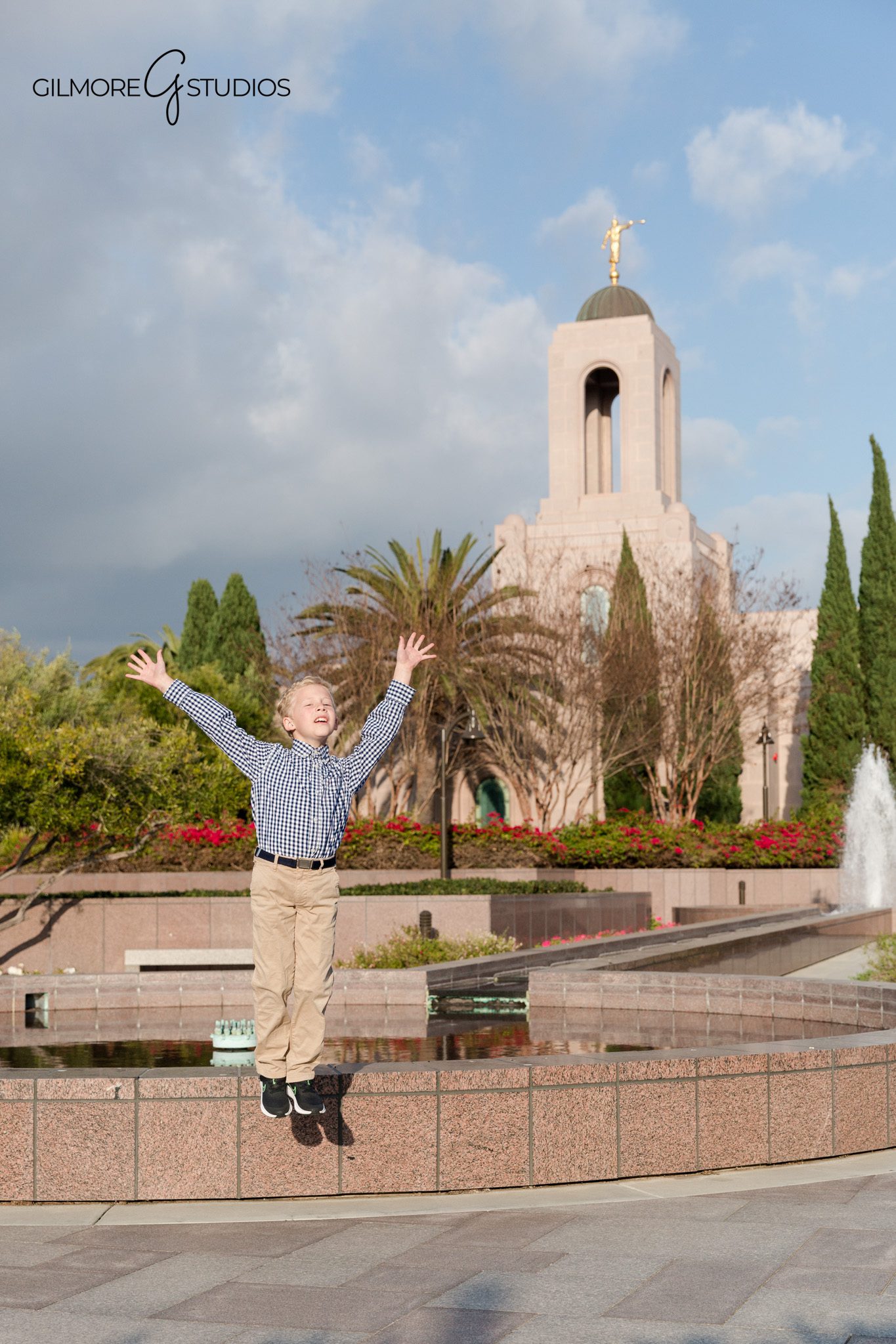 LDS baptism photo session with temple fountain and flowers
Newport Beach Temple portrait of boy preparing for baptism