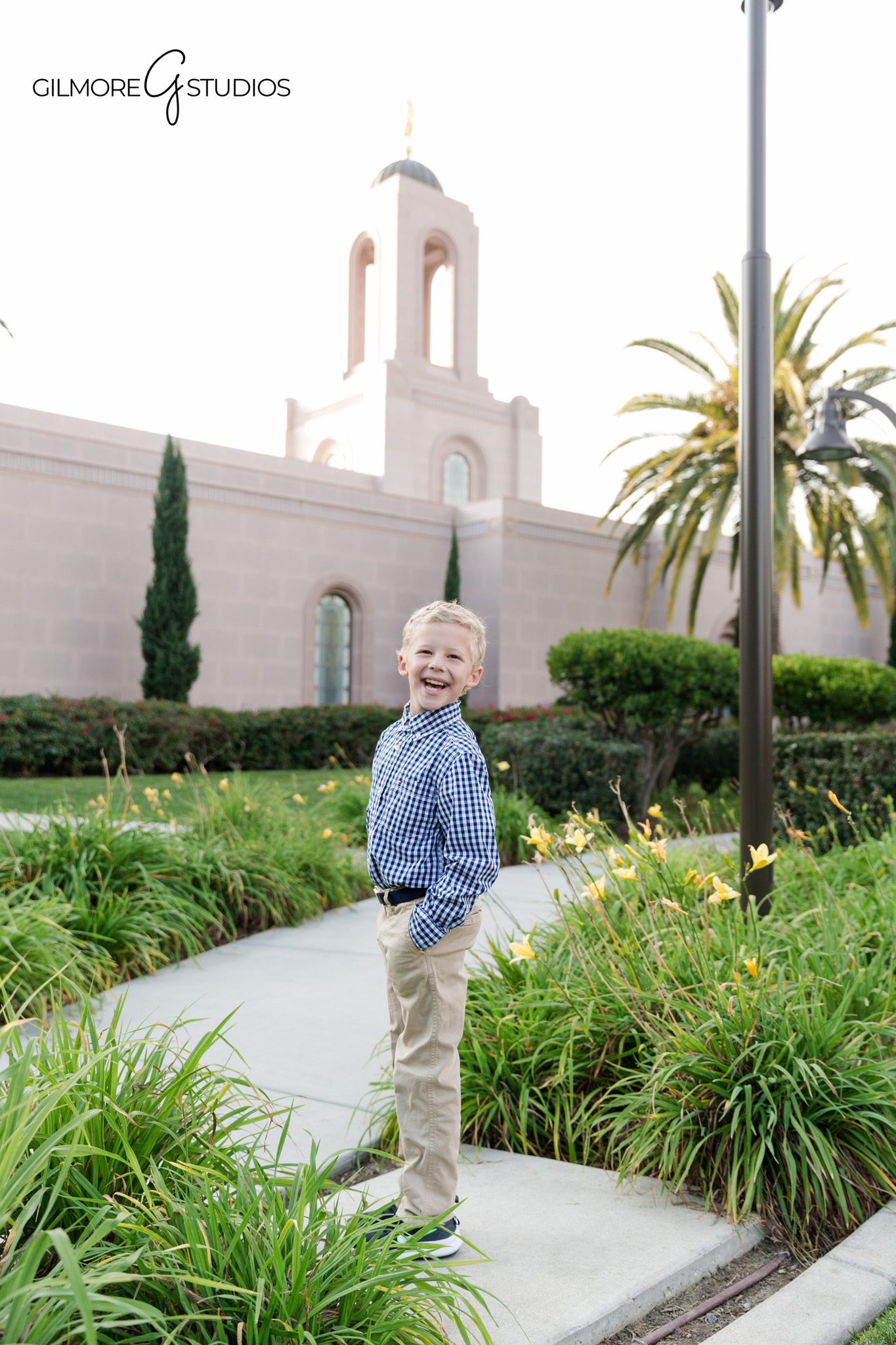 Newport Beach California Temple baptism photos with fountain
LDS baptism portrait with temple tower and blue sky