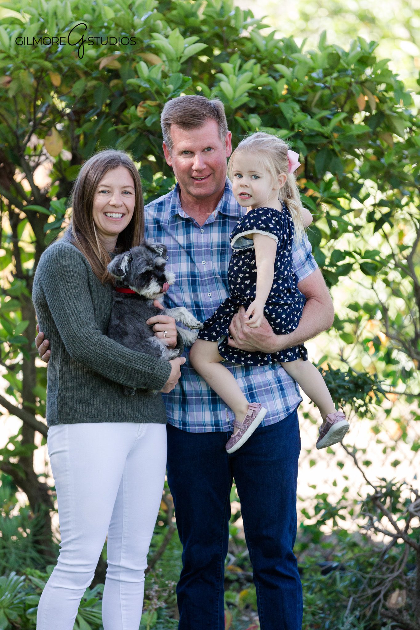 At-home family photography session in a beautiful backyard garden
Children playing in the grass during a backyard family photo session