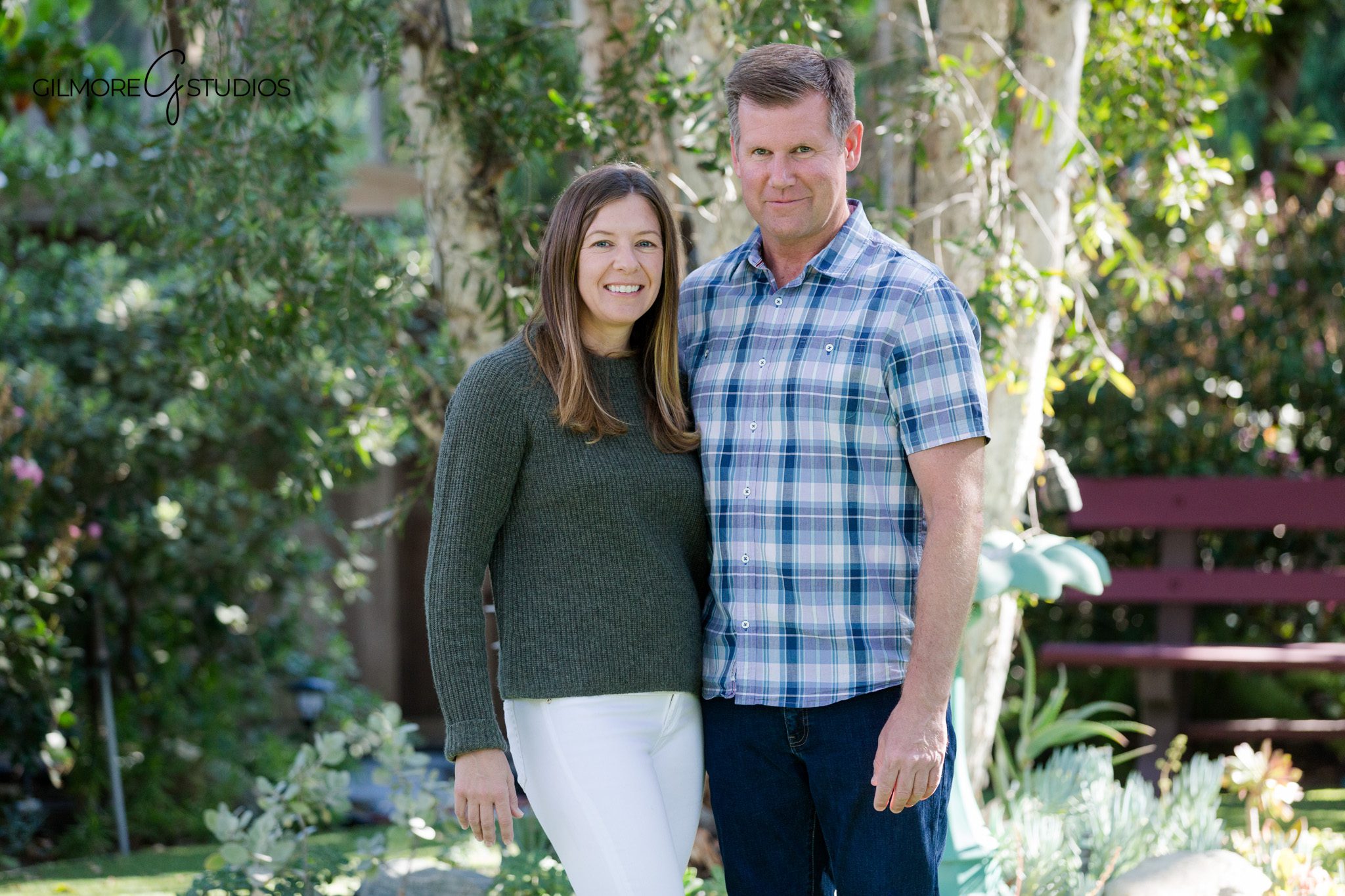 Backyard family photos with relaxed natural posing and soft light
At-home family photography with meaningful backyard details