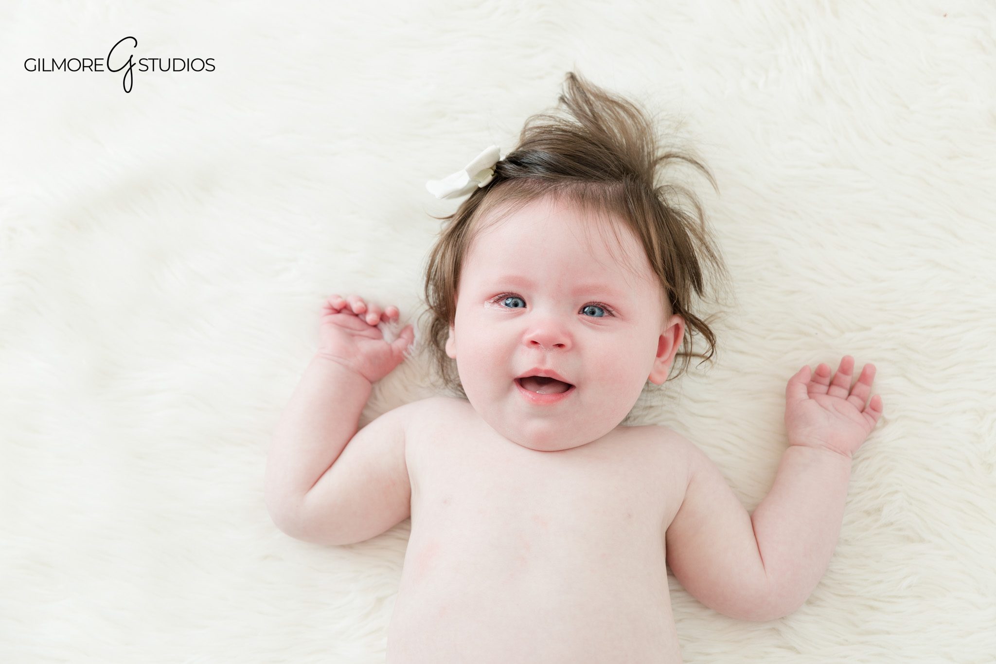 First year baby photos with sitting up milestone portraits
Baby milestone session showing personality before first birthday photos