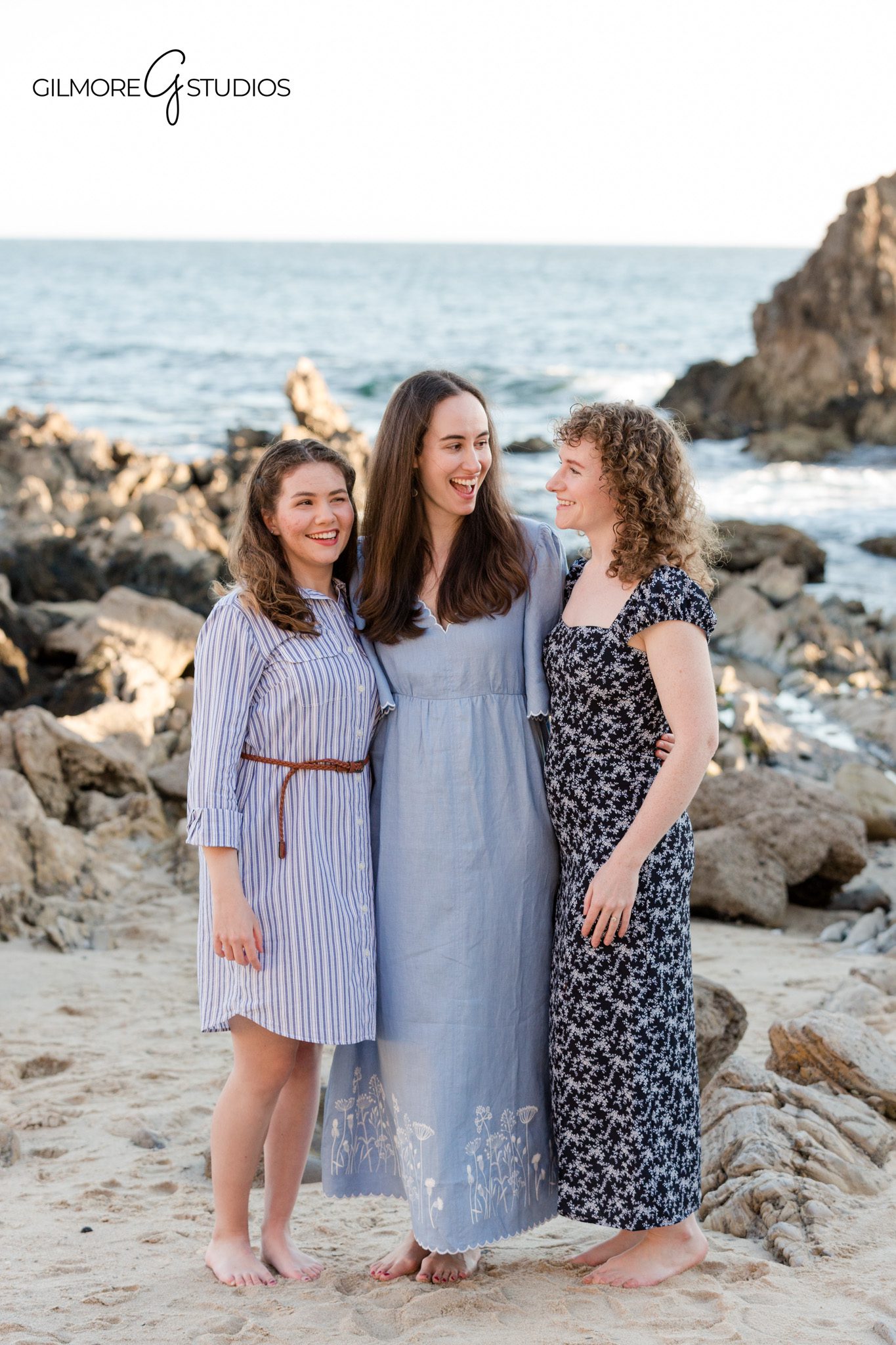 Newport Beach family reunion photos with three generations on the beach
Large extended family session with coordinated coastal wardrobe