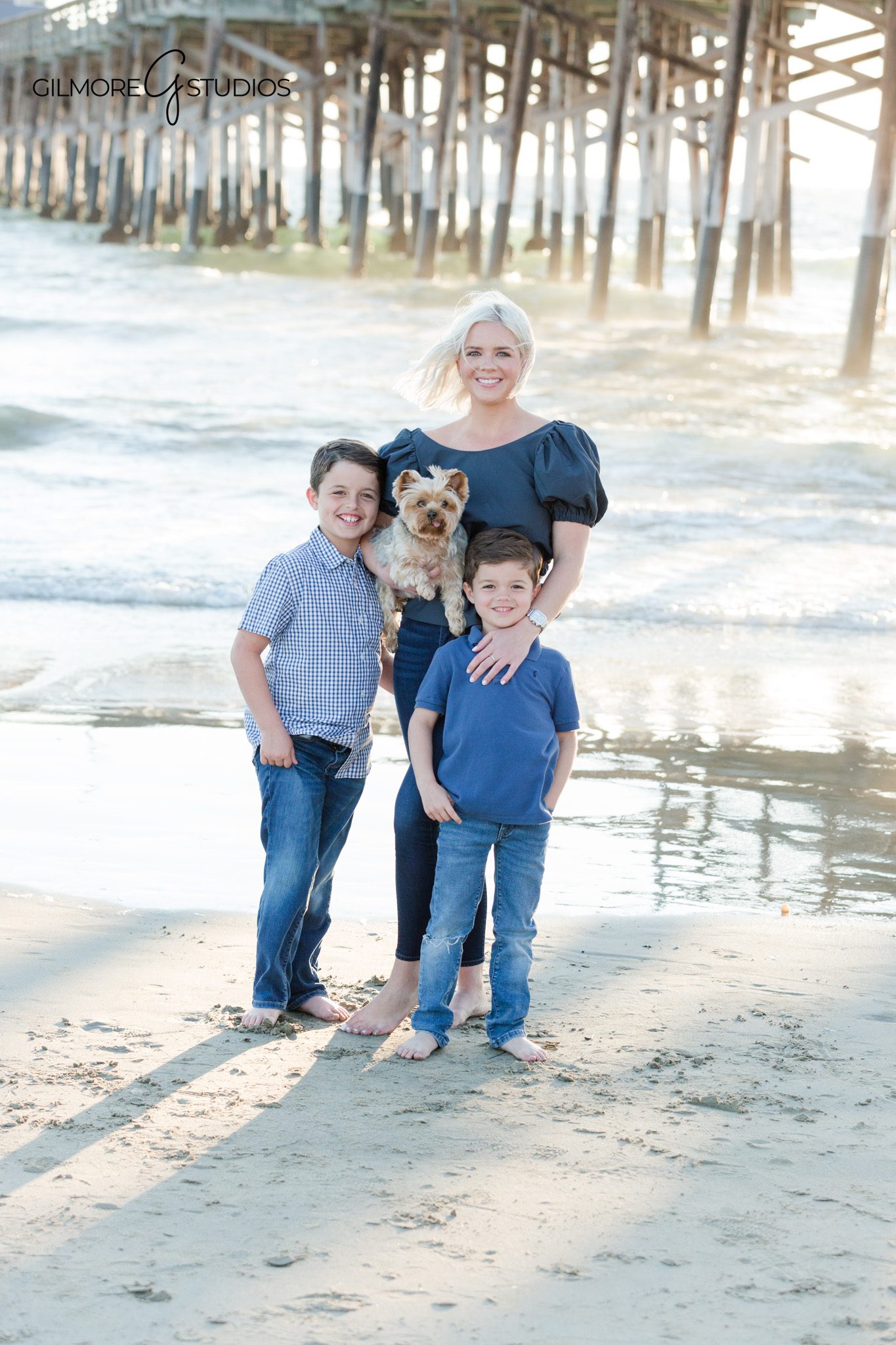 Newport Pier family session with soft coastal wardrobe and sunset light
Orange County family photographer capturing natural beach portraits