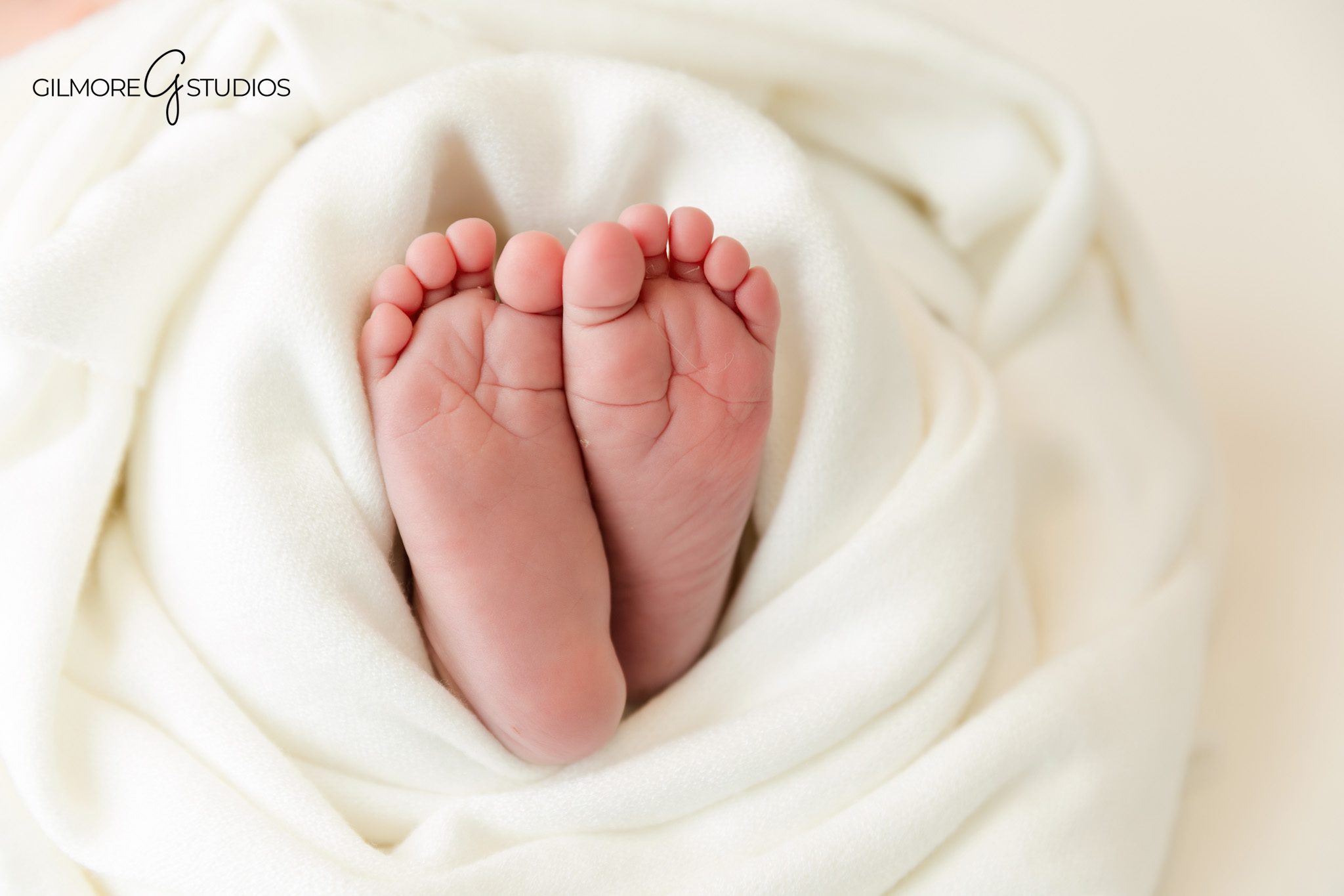 Newborn baby sleeping beside a handmade carrot prop in Chandler AZ studio
Sweet newborn portrait with neutral bunny bonnet and white background