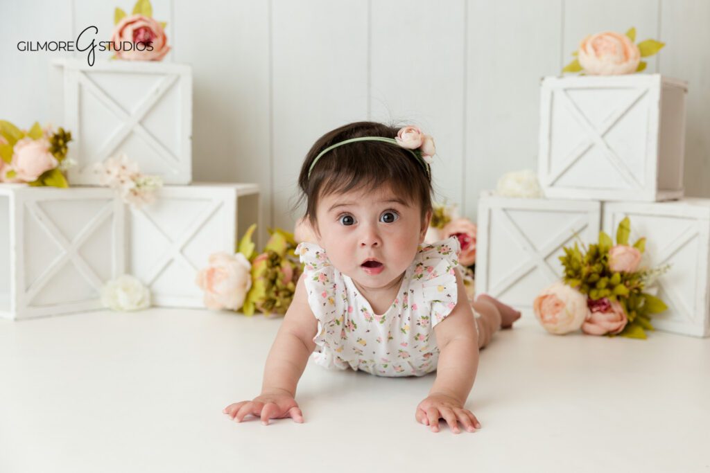 Gilbert Arizona baby photographer capturing sitter session portraits
Sitting up milestone photos for baby girl in floral outfit