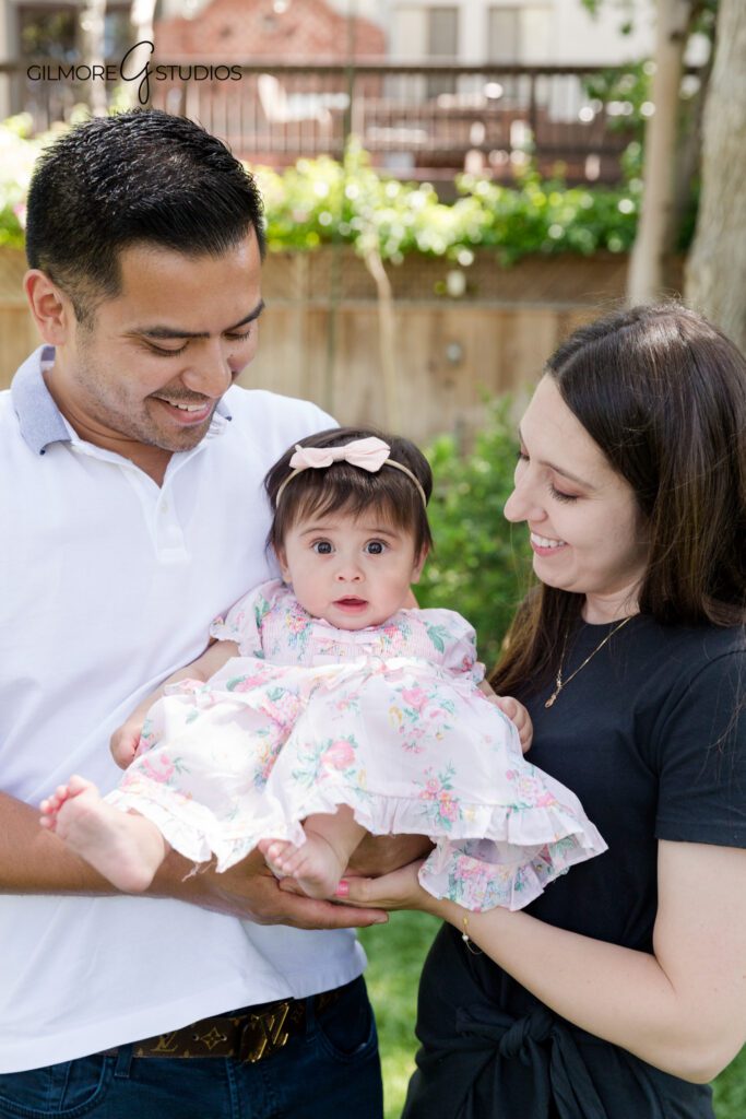 Sweet sitter session for baby girl in Gilbert Arizona
Baby girl looking at camera during sitting up milestone photos