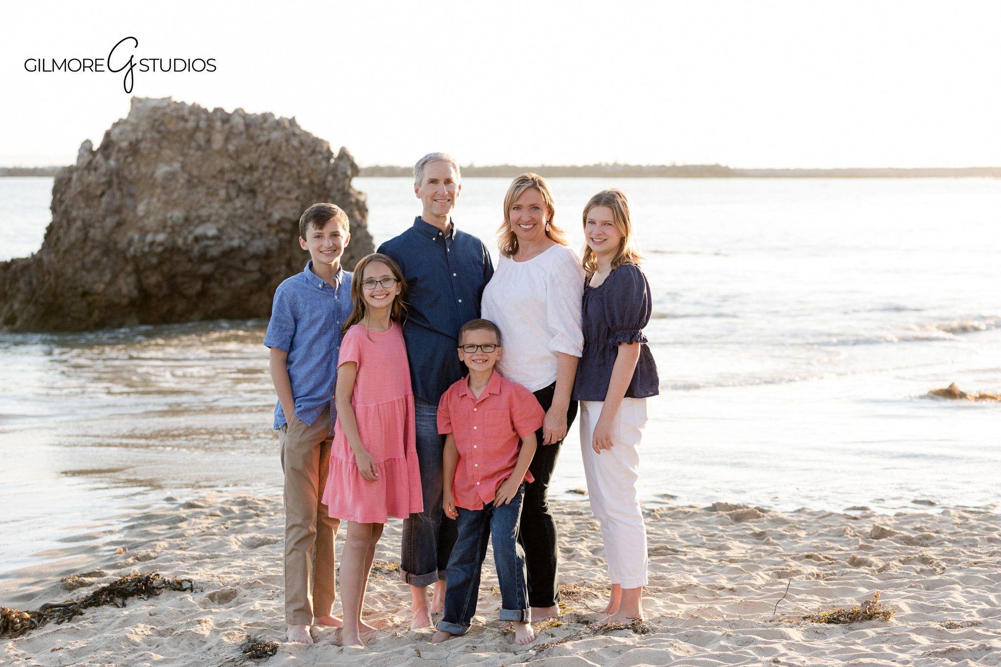 Multi-generational family portraits at Big Corona Beach in Newport Beach
Big Corona Beach family session with cliffs, sand, and ocean views