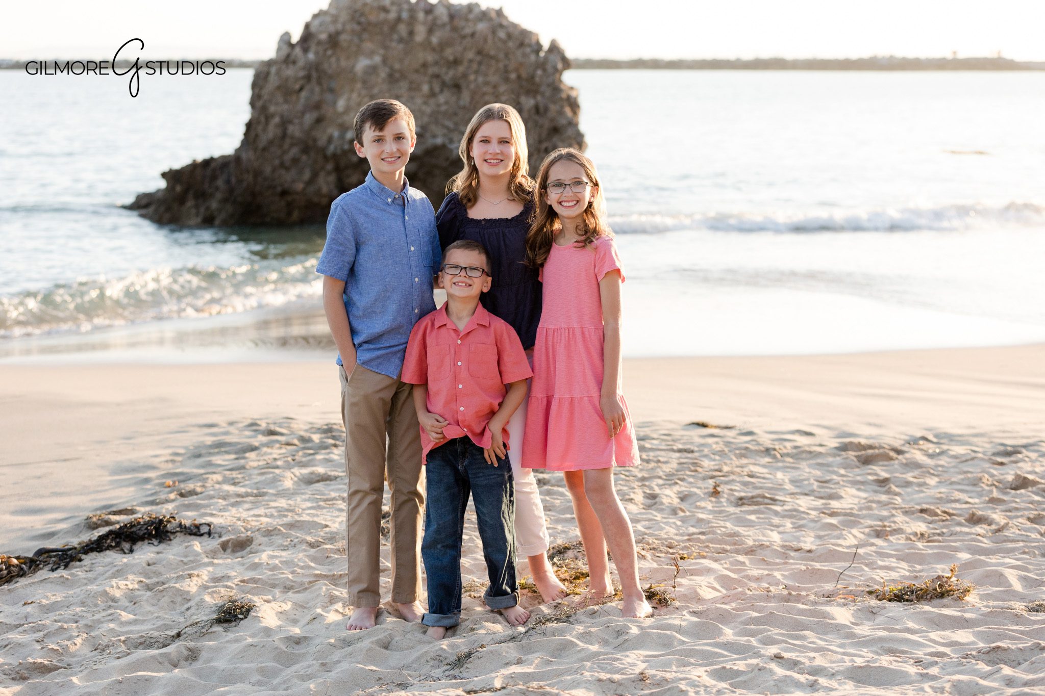 Extended family beach photos with adult children, spouses, and cousins
Big Corona Beach family portraits with coordinated coastal wardrobe