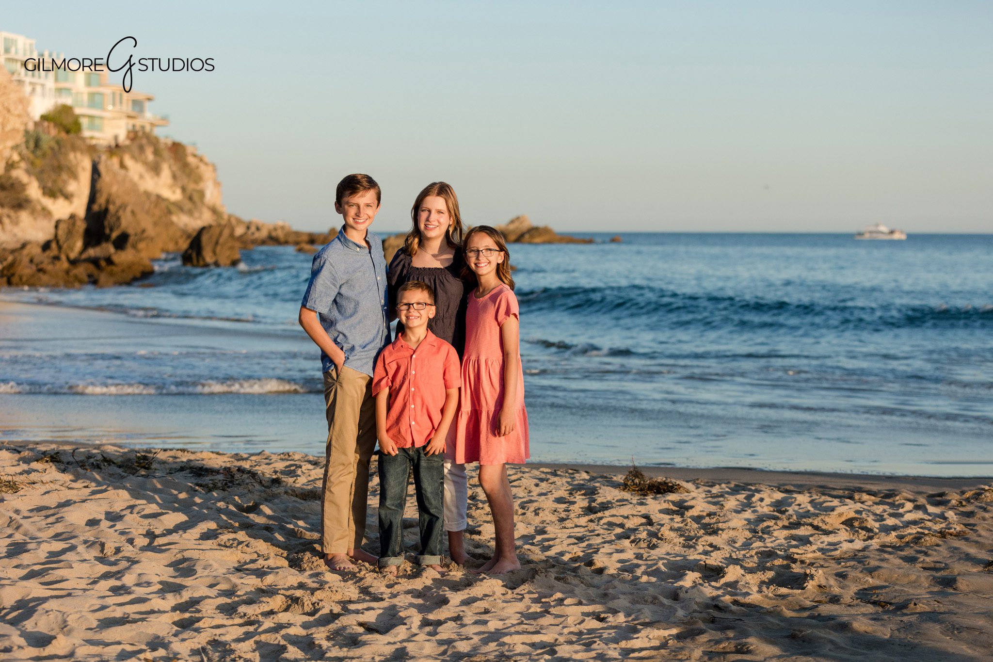 Big Corona Beach family photographer capturing natural candid moments
Family of four photographed at Big Corona Beach during golden hour