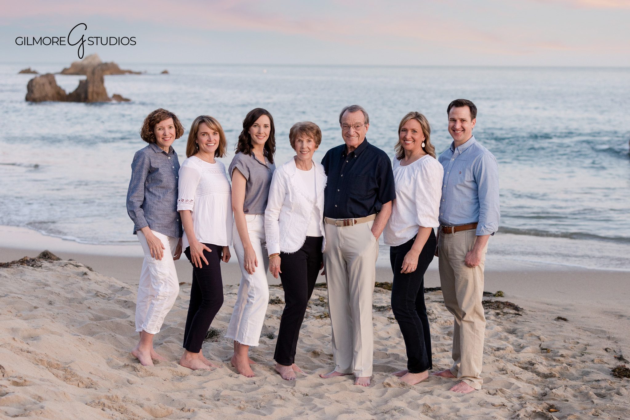 Grandparents with grandchildren during a Corona del Mar beach photo session
Orange County beach family photographer capturing Big Corona portraits