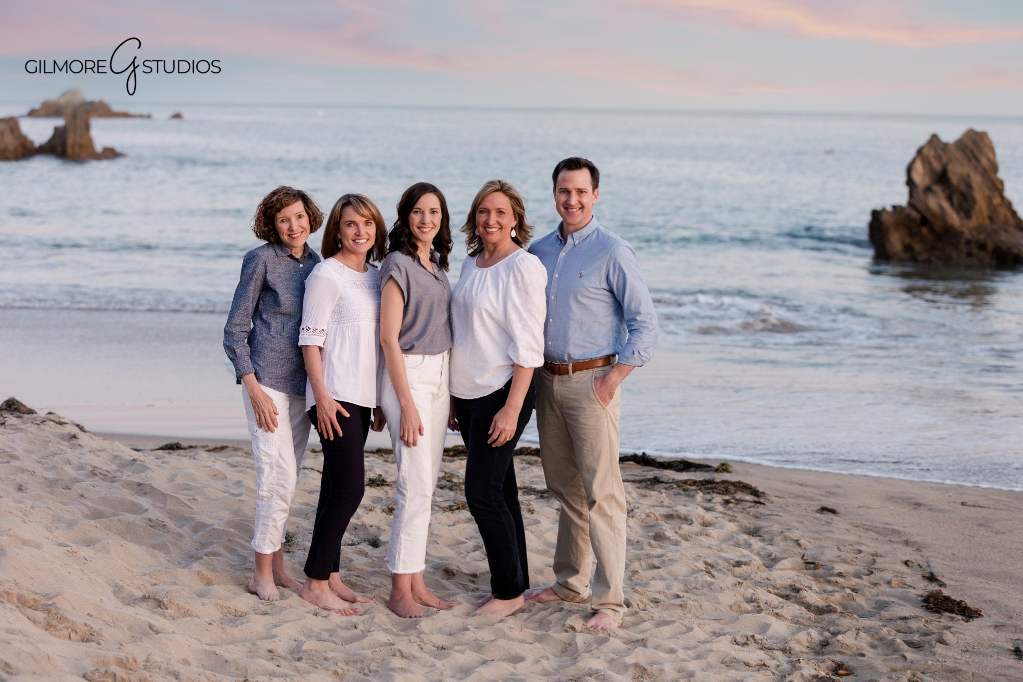 Extended family portrait with grandparents centered at Big Corona Beach
Family photos at Big Corona with soft coastal colors and neutral outfits