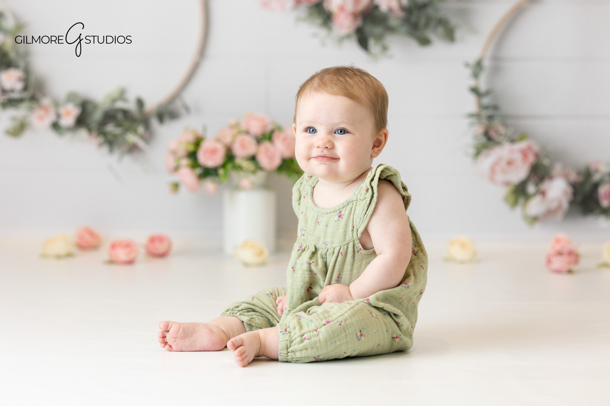 Baby sitting up portraits with soft light and natural expression
Gilmore Studios baby milestone photos for first year portraits