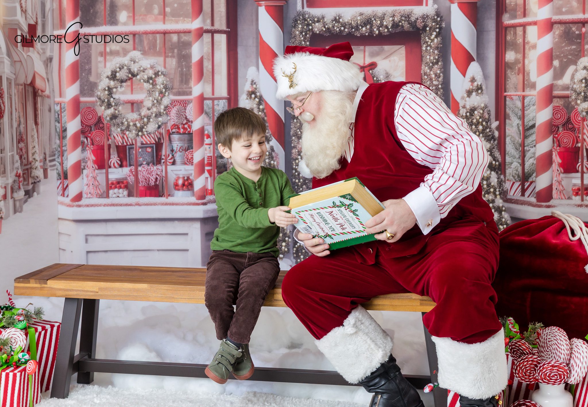 Santa mini session with children in cozy Christmas set
Christmas photos with Santa and children at Gilmore Studios
