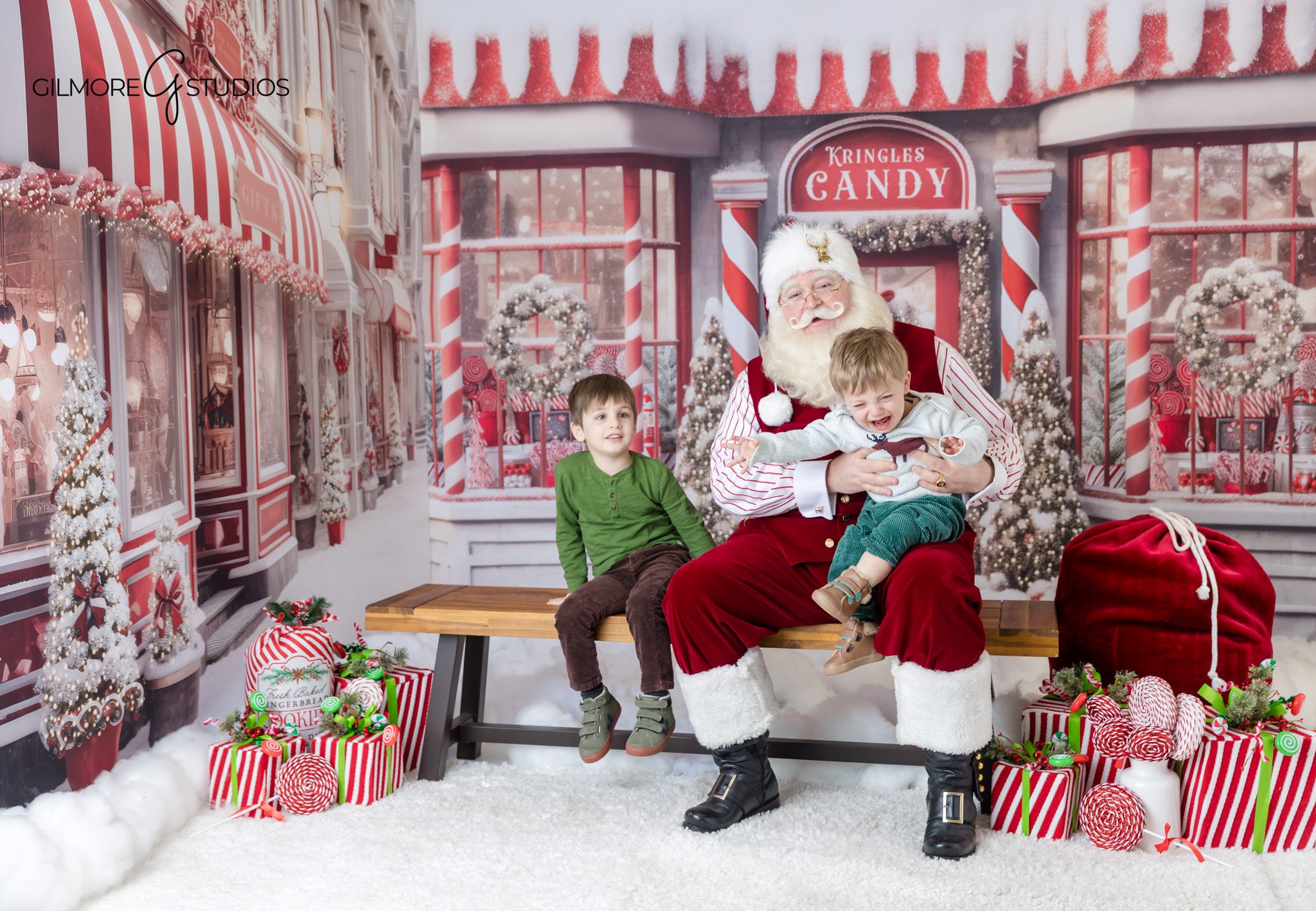 Sweet Santa portrait with child in plaid Christmas dress
Christmas mini session with Santa reading to child