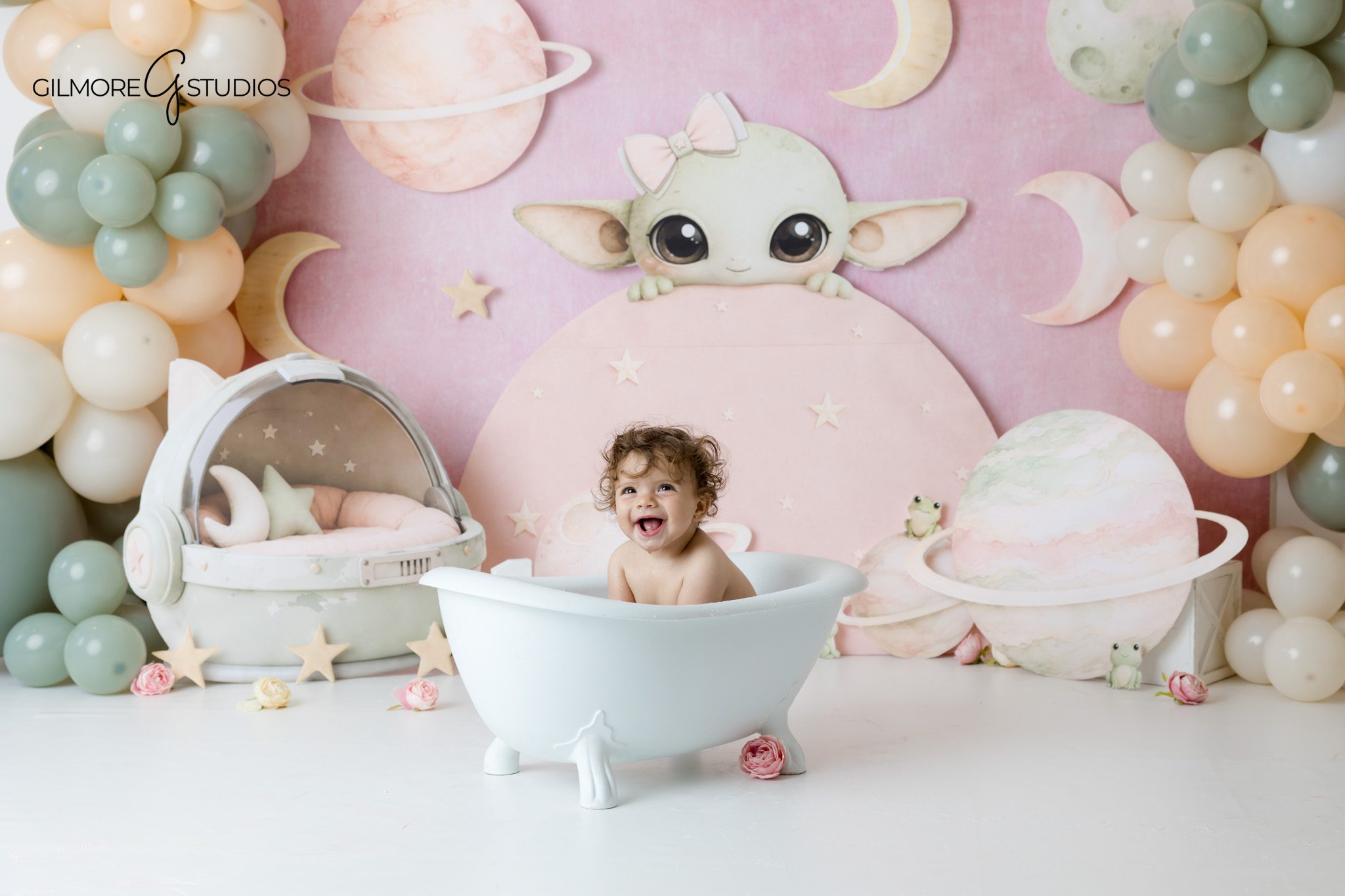 First birthday cake smash with baby exploring frosting and cake
Newport Beach baby milestone photographer creating themed first birthday portraits
