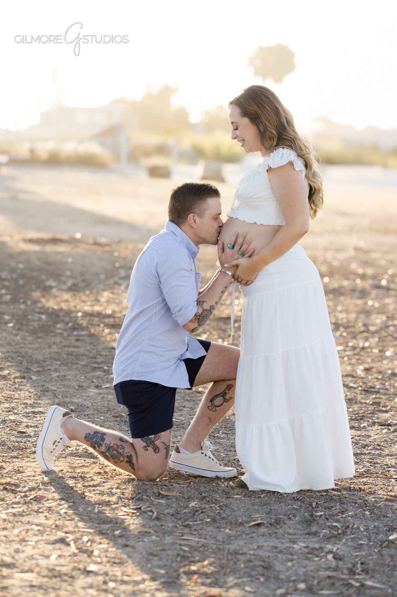 Newport Beach proposal photographer capturing engagement during maternity portraits
Expecting couple walking together during a Back Bay maternity session