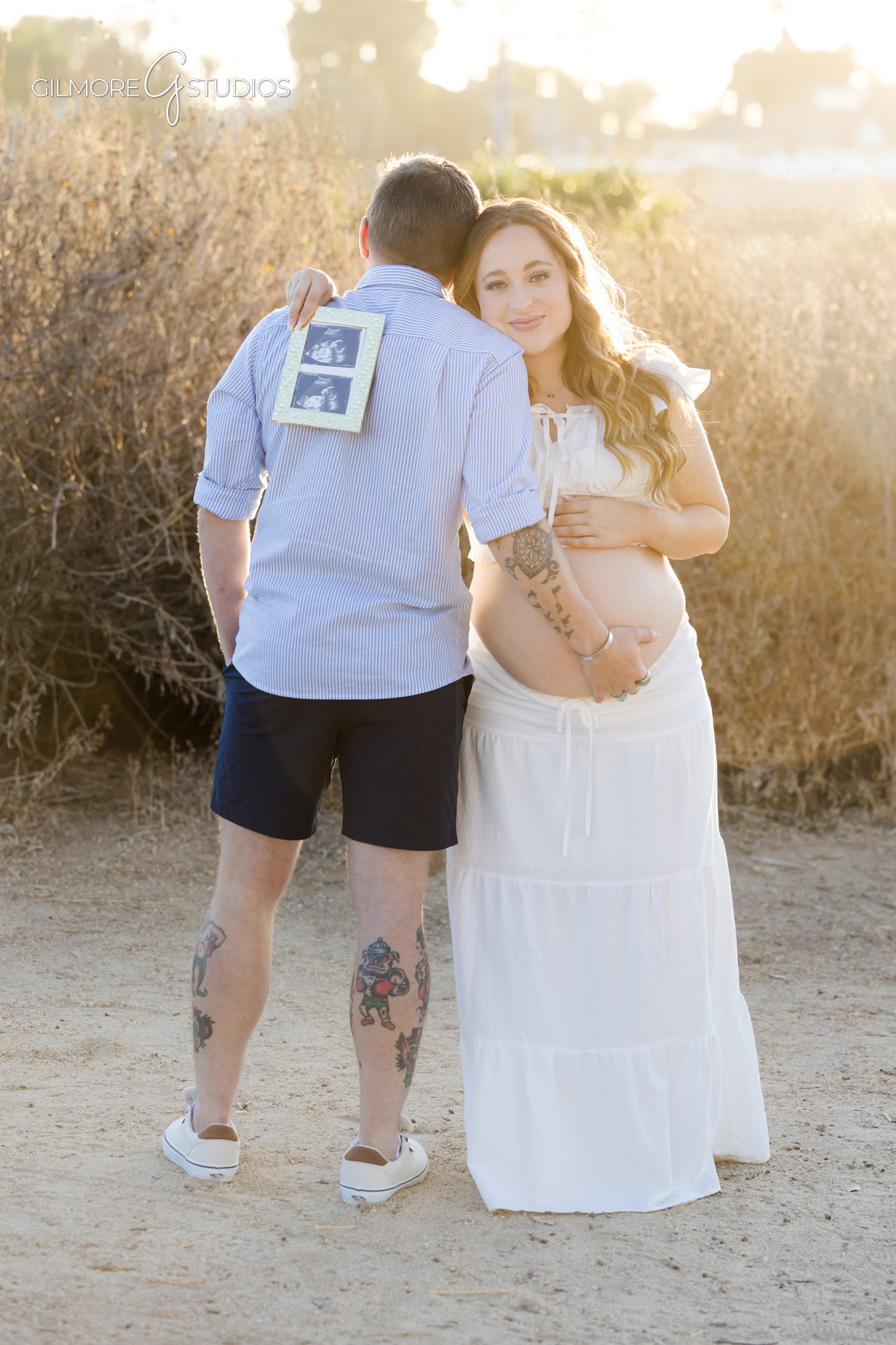 Back Bay maternity portraits with romantic proposal moment
Surprise engagement photos during Newport Beach maternity session