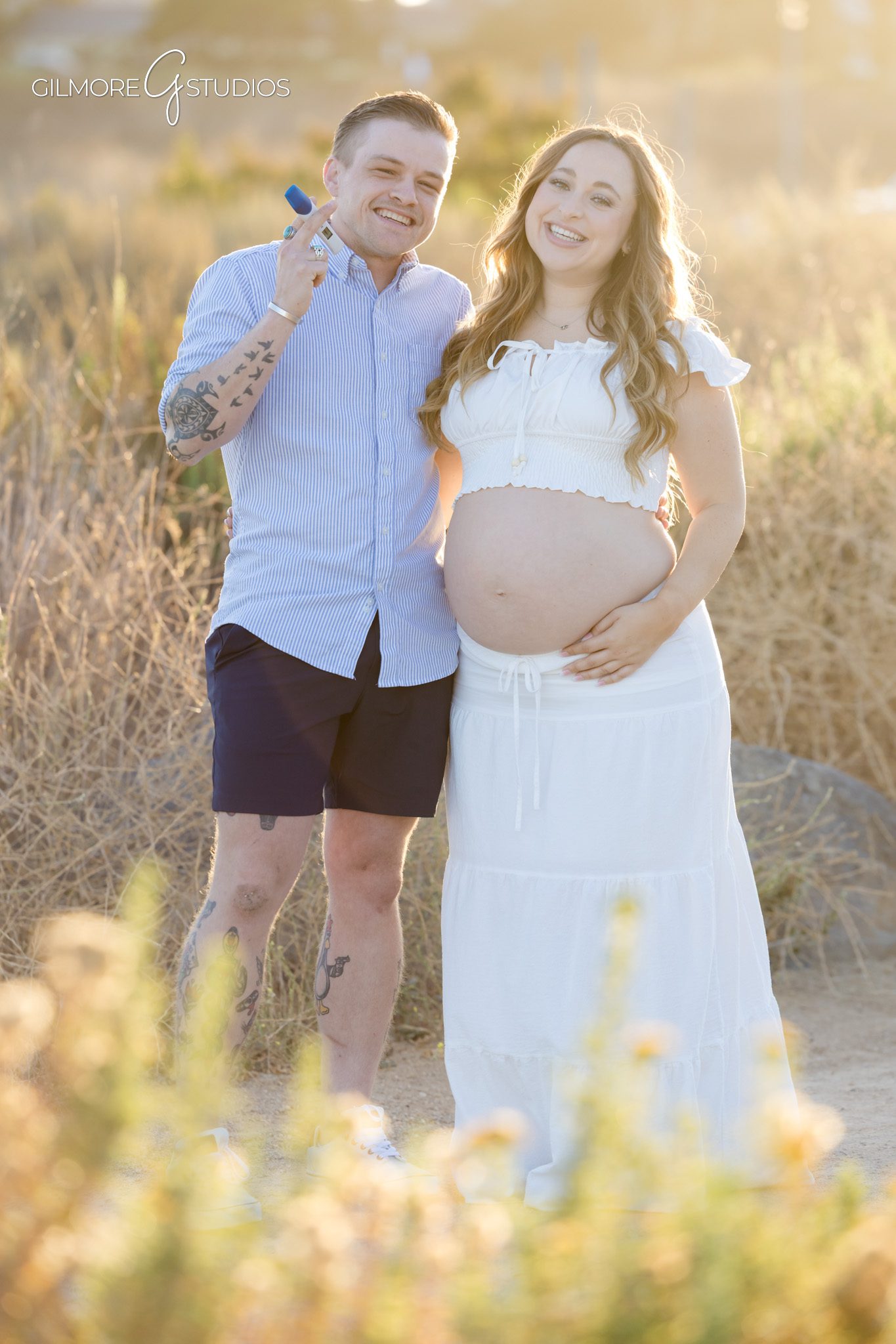 Proposal during pregnancy photo session with emotional reaction
Newport Beach Back Bay maternity photos with engagement ring detail