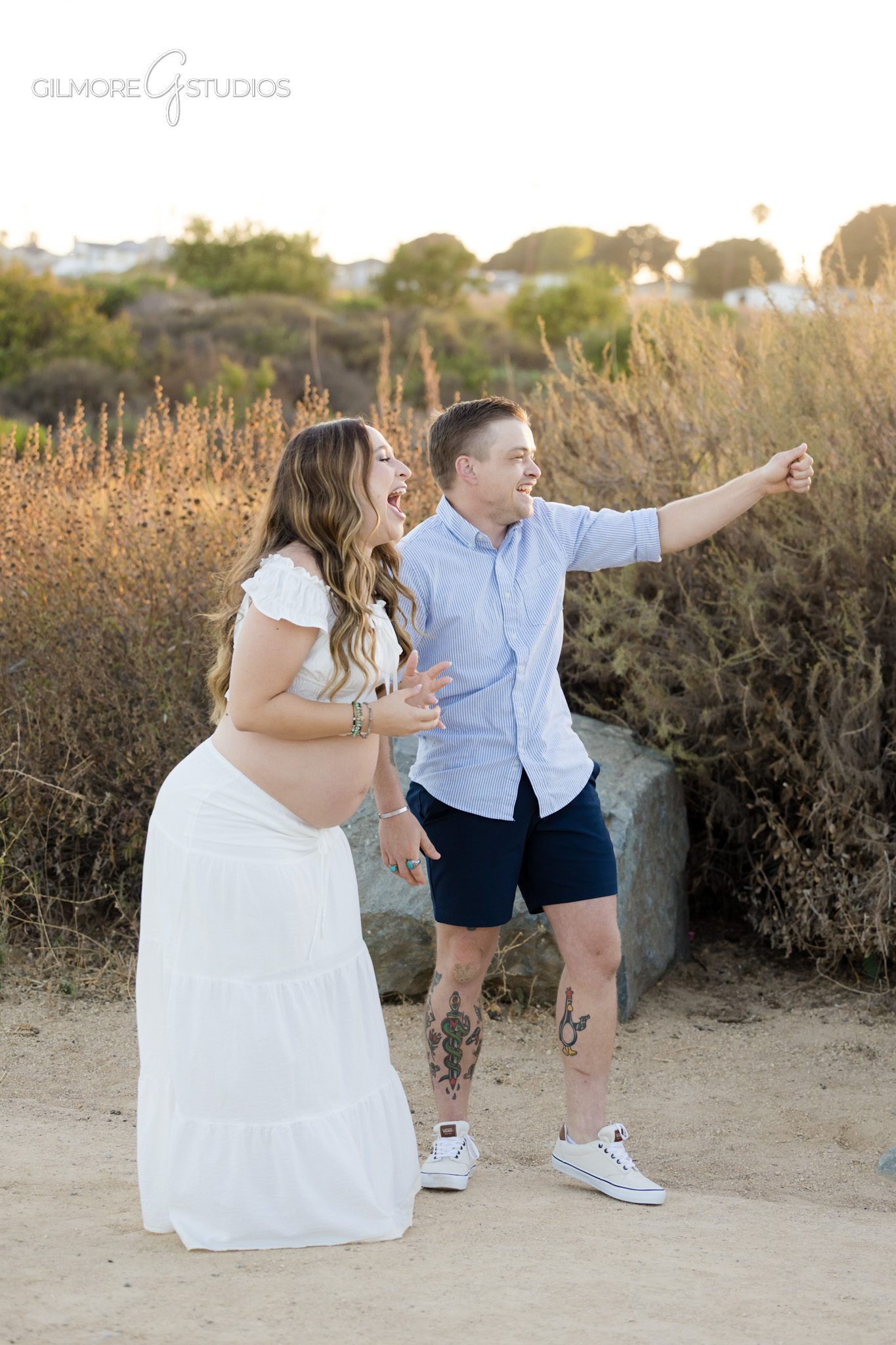 Expecting parents celebrating proposal during Newport Beach maternity session
Surprise engagement during maternity photos in Newport Beach California