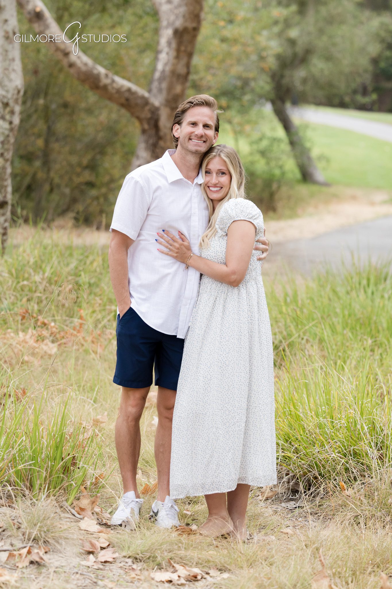 Grandparents with their adult children during a multigenerational portrait session
Extended family photo session with coordinated wardrobe and natural scenery