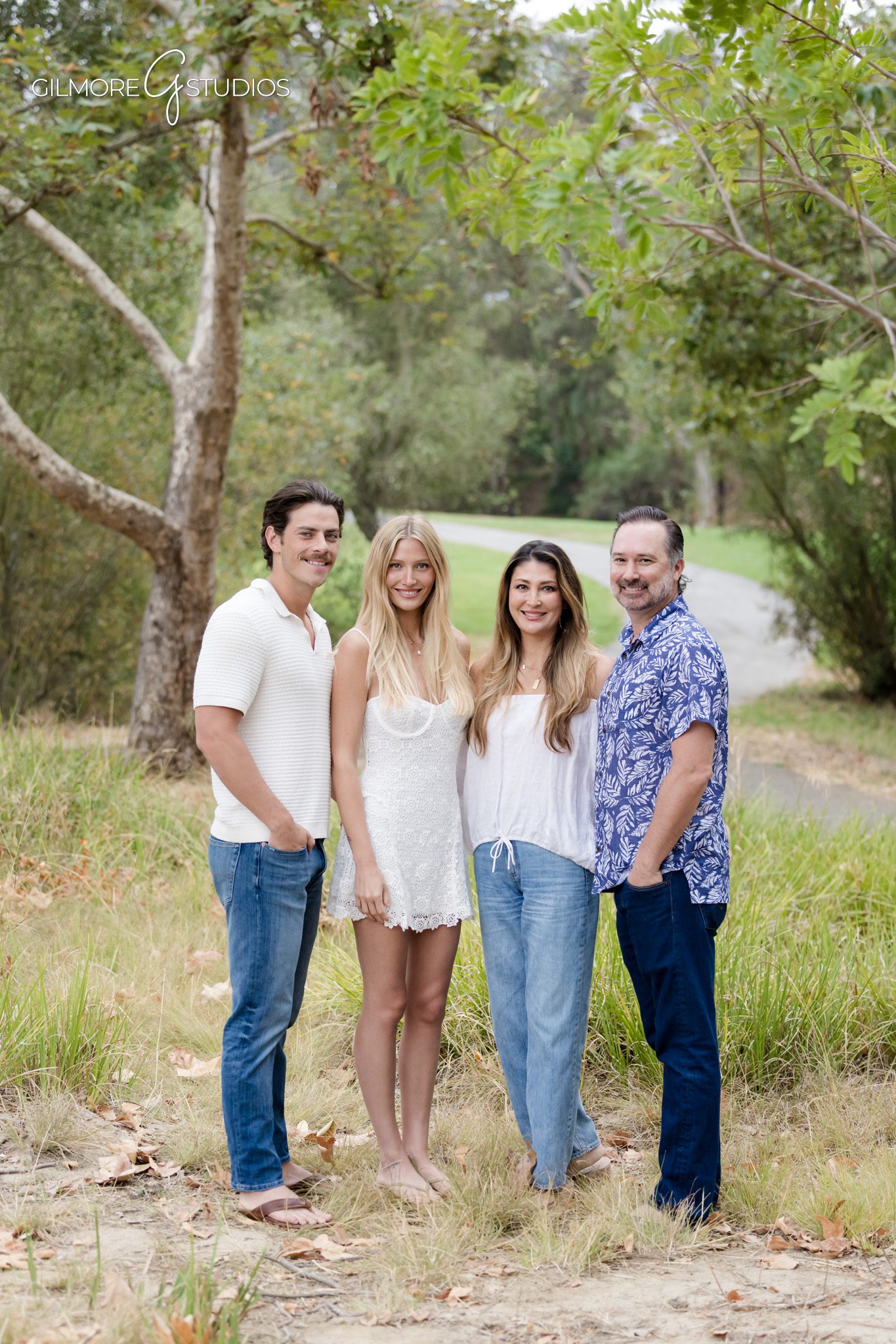 Extended family session with cousins sitting together in natural light
Large family photos at Canyon Park with layered posing and outdoor background