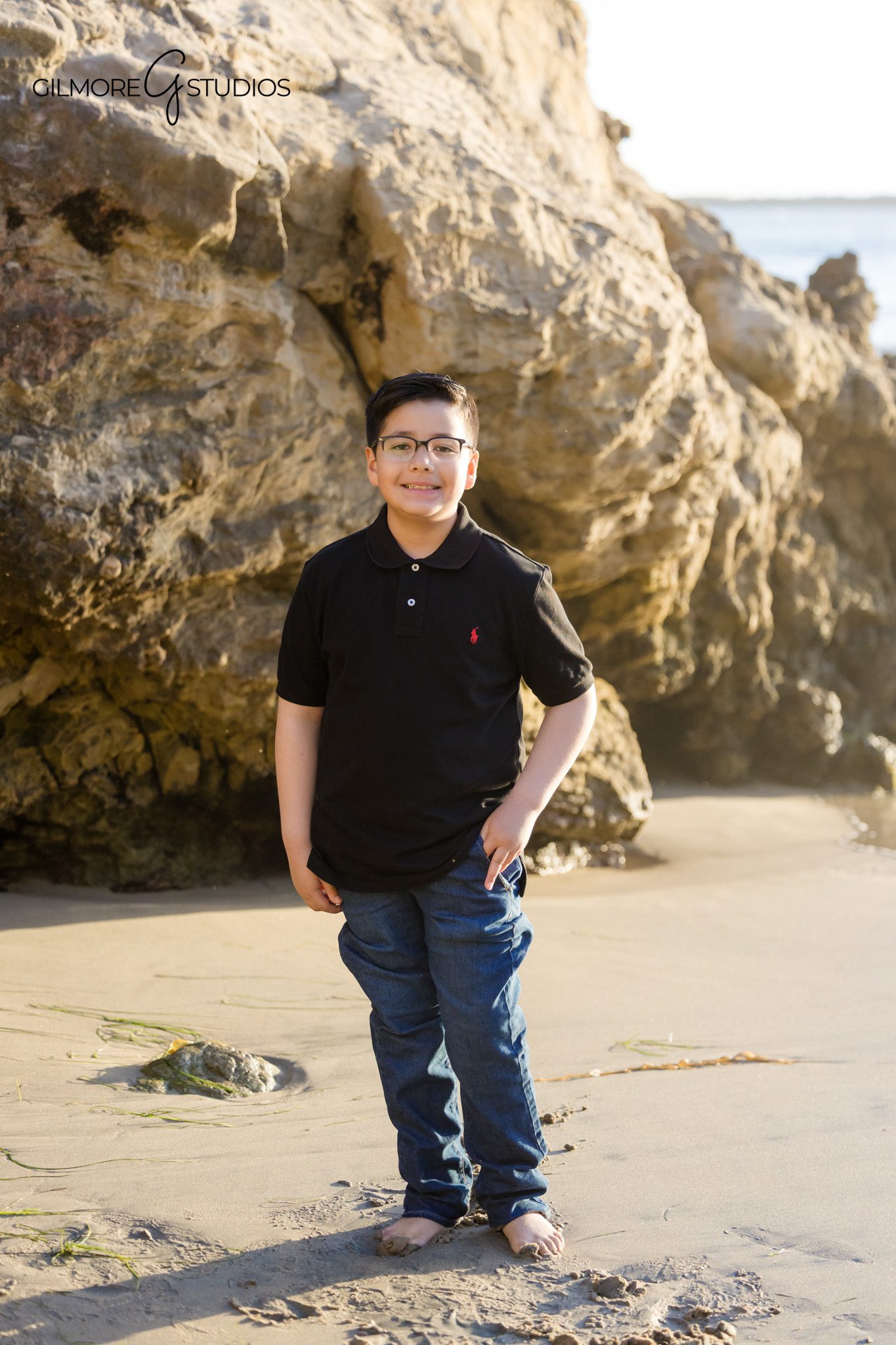Big Corona Beach family photos with warm reflections in the sand
Orange County family photographer capturing sunset session at Big Corona