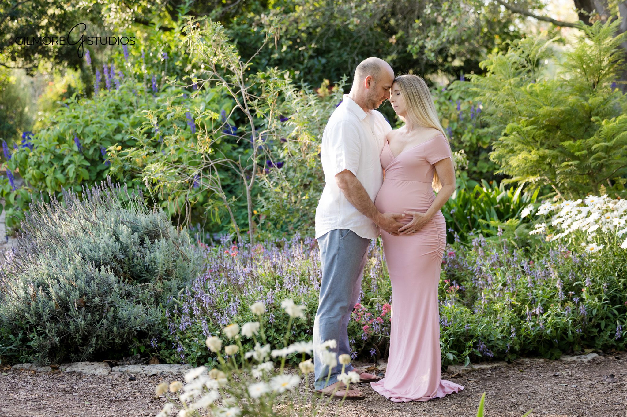Huntington Beach Central Park maternity photos with flowers and greenery
Huntington Beach maternity photographer capturing garden pregnancy portraits