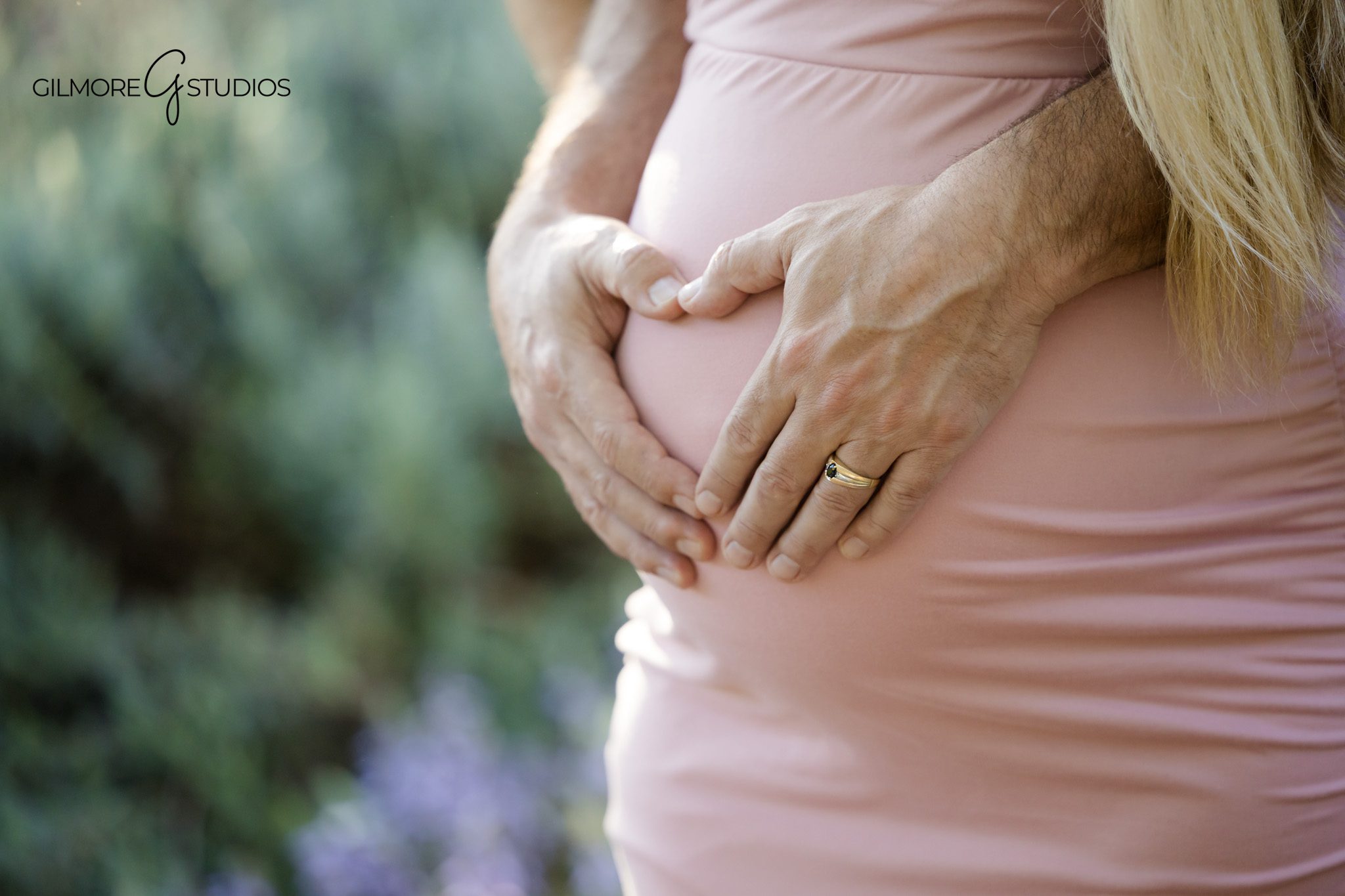 Maternity portraits with flowers and natural garden backdrop
Huntington Beach garden maternity session with soft floral colors