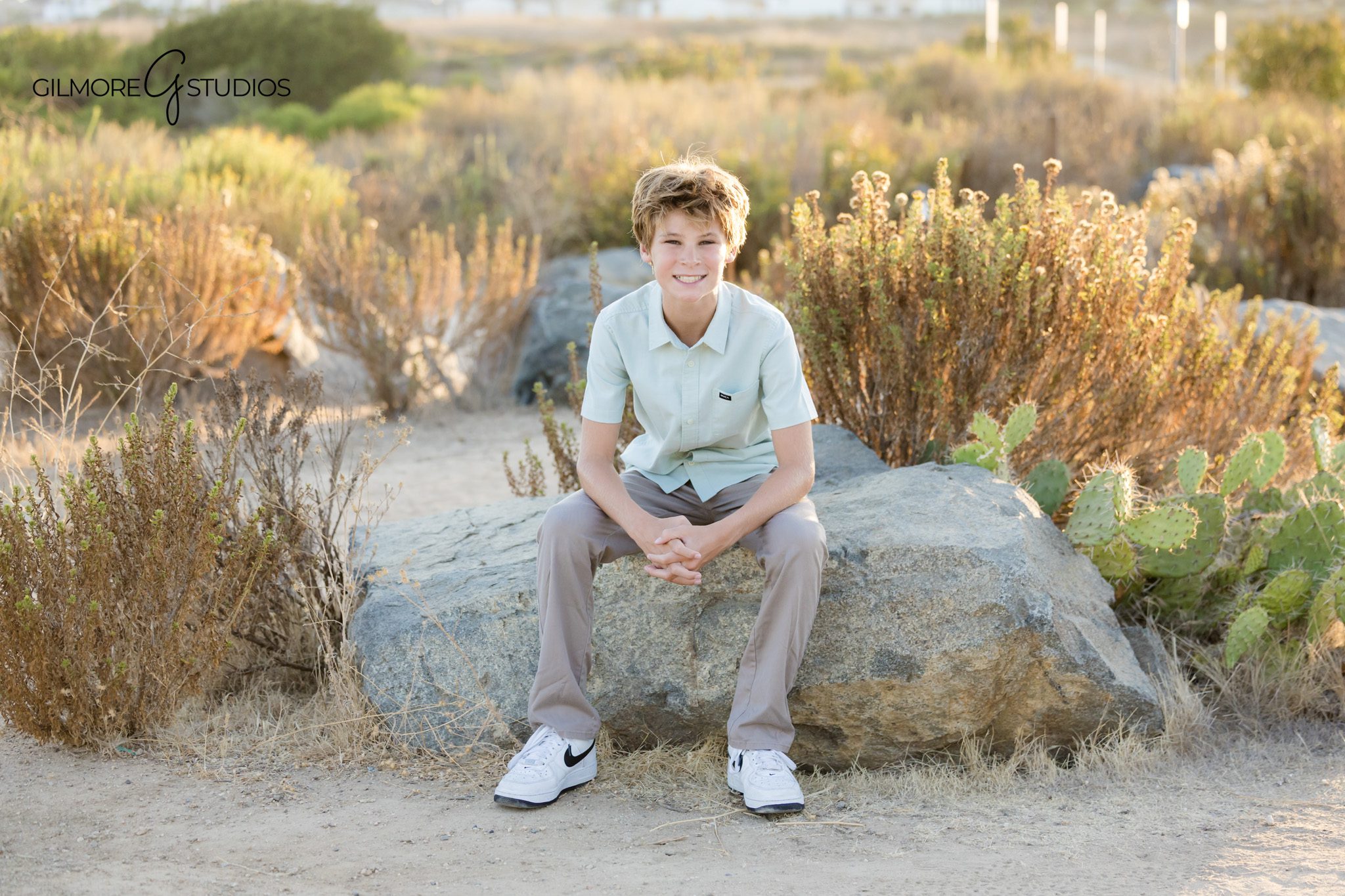 Back Bay Nature Preserve session with relaxed family posing
Mom and dad with sons during Newport Beach family portraits