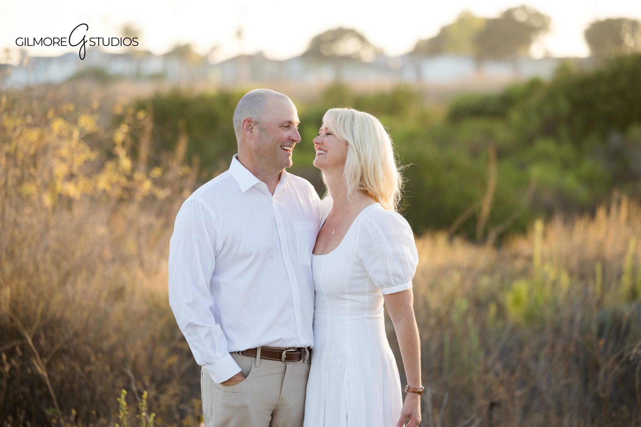 Family photos with two boys at Back Bay Nature Preserve
Back Bay family portraits with white dress and soft blue shirts
