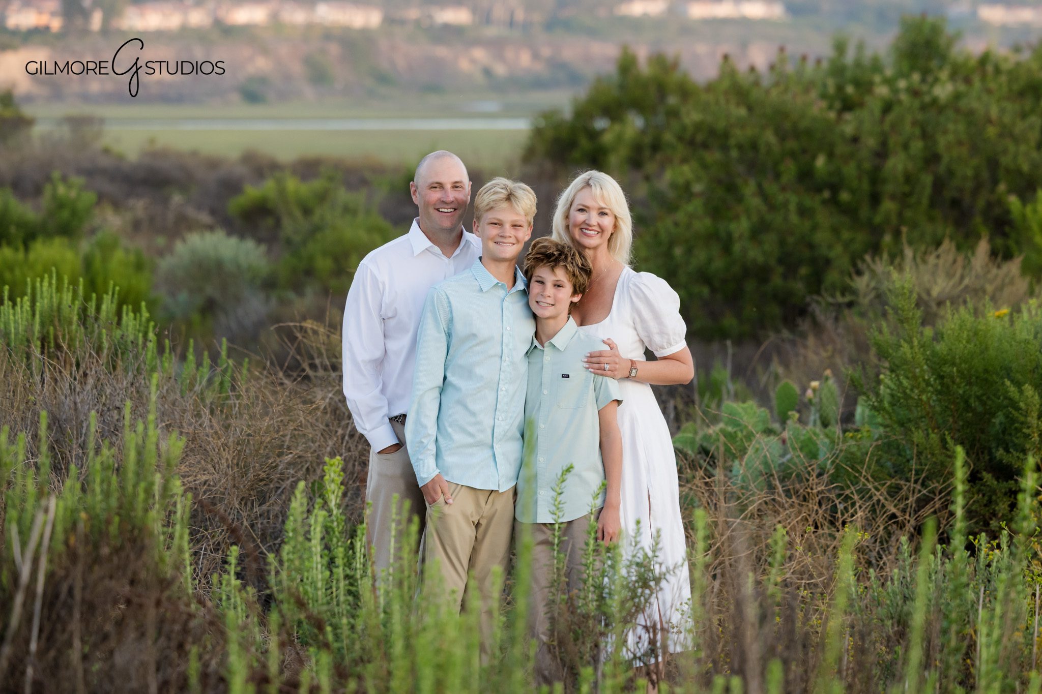 Family portrait on dirt trail at Back Bay Nature Preserve
Golden hour family photographer in Newport Beach at Back Bay