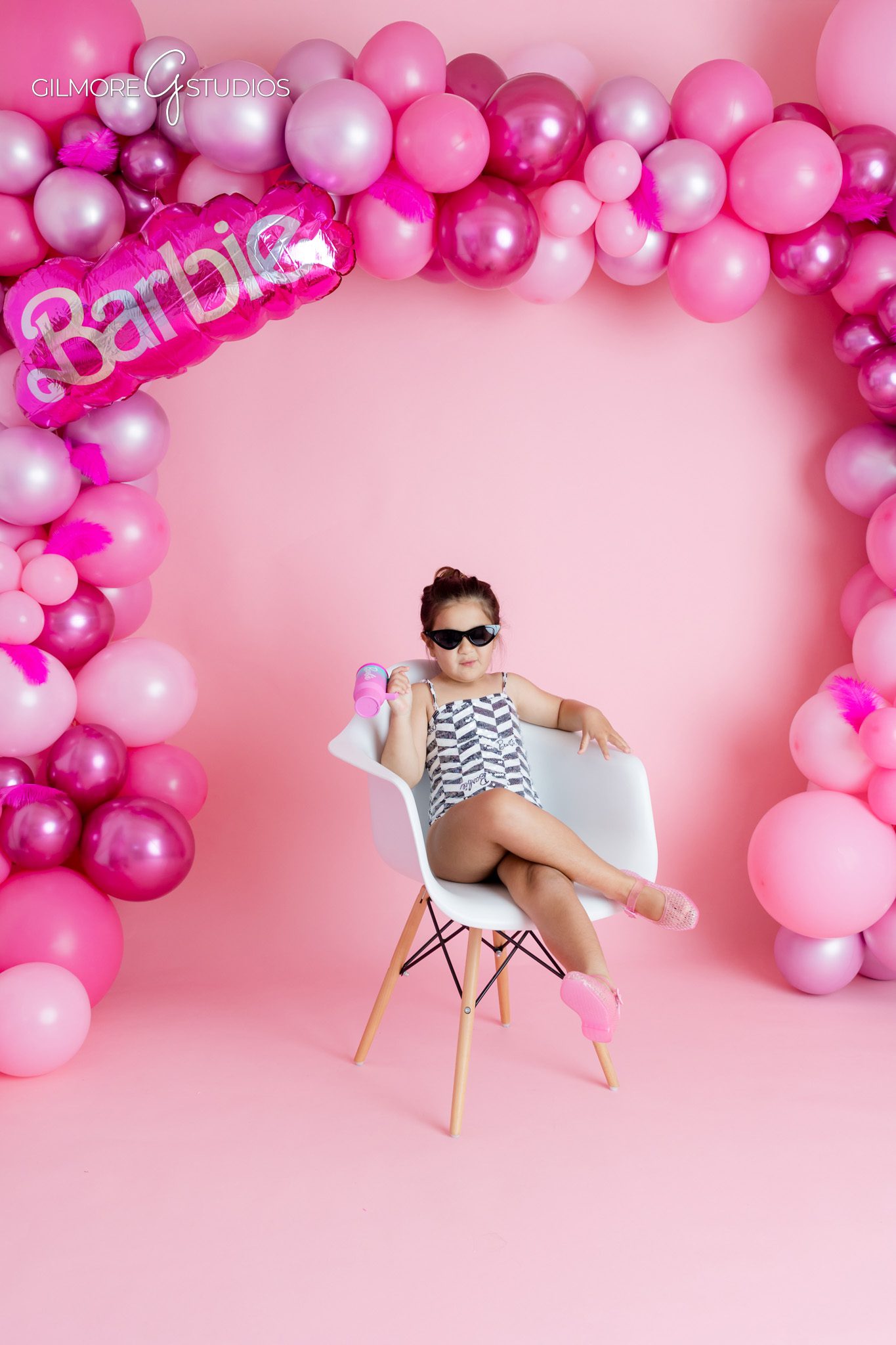 Barbie themed studio birthday portraits by Gilmore Studios
Five year old girl in pink tutu dress during Barbie birthday session