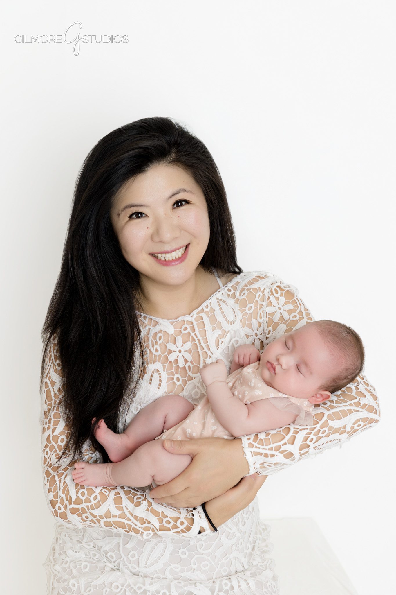 Queen Creek AZ newborn photographer for babies after 6 weeks
Baby girl looking toward camera during older newborn photography session