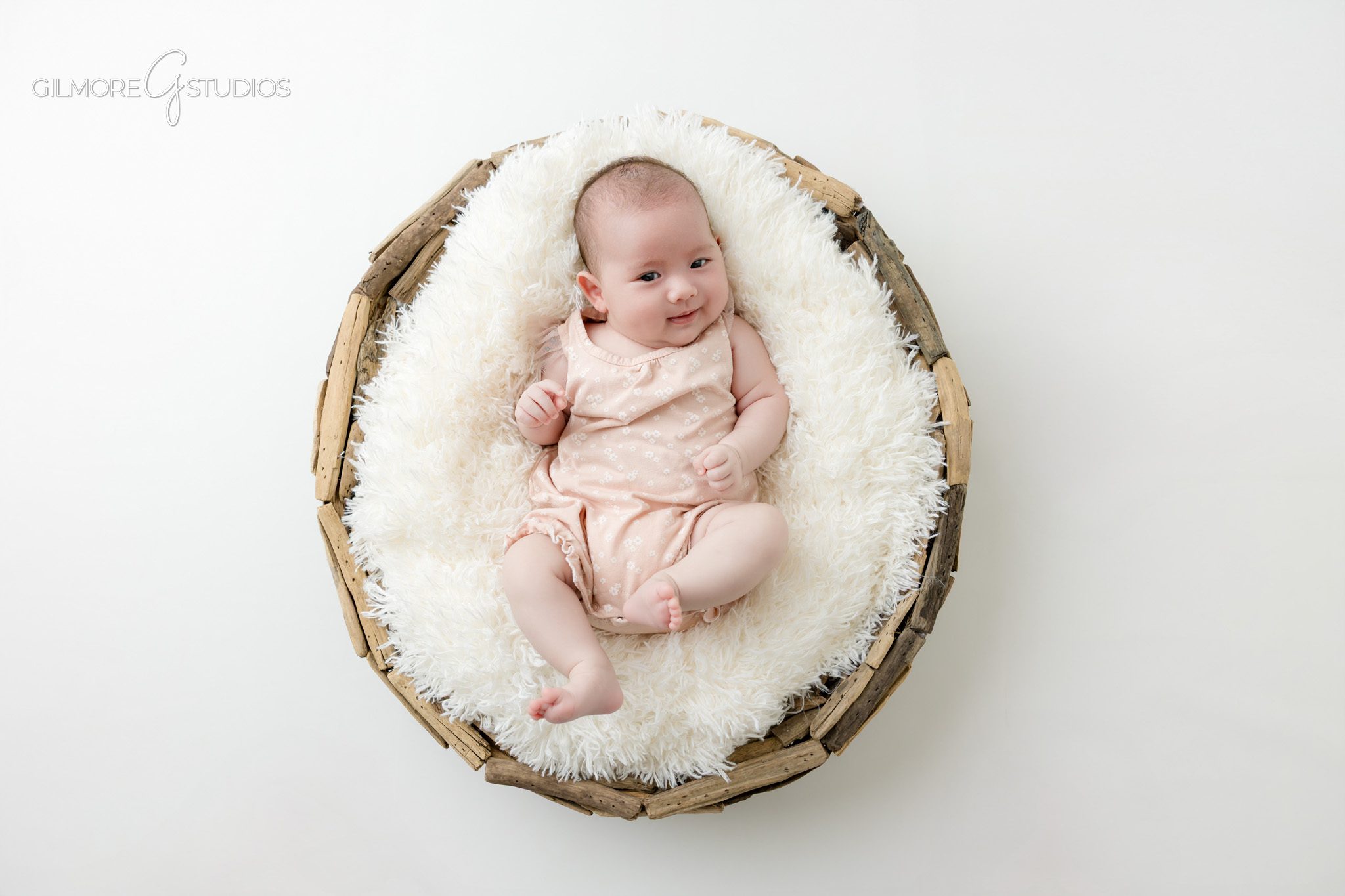 Big brother smiling with baby sister during older newborn photos
Queen Creek AZ baby photographer capturing family newborn portraits
