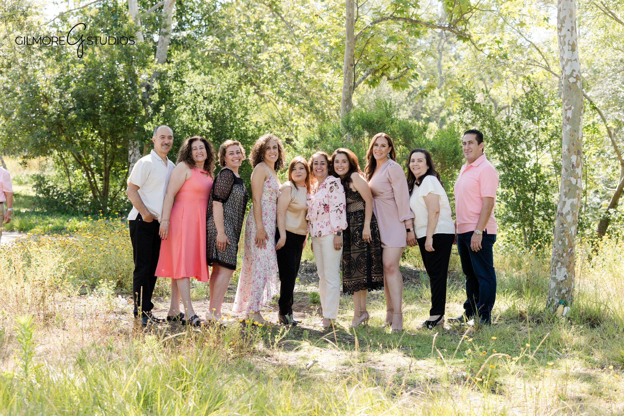 Extended family photography with couple posing among trees and wildflowers
Canyon Park portrait of a couple during family photo session