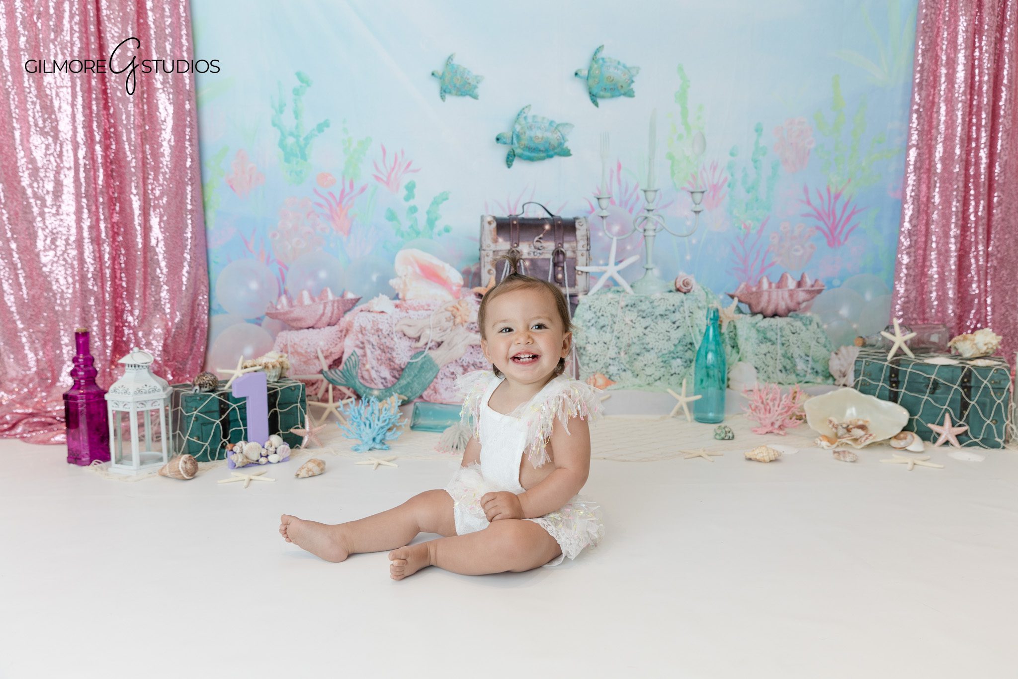 One year old birthday portrait with crown and soft natural light
Newport Beach baby photographer capturing outdoor first birthday portraits