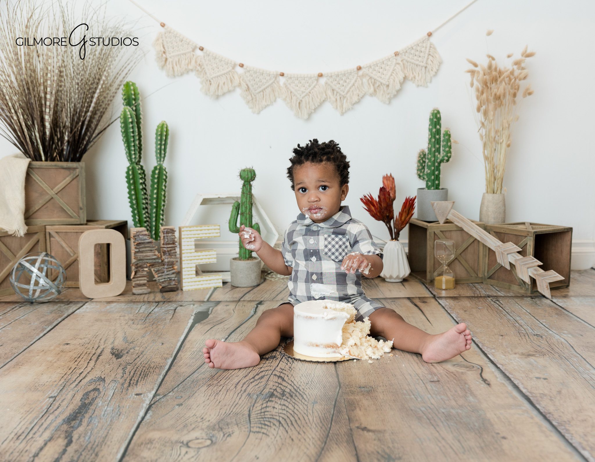 One year milestone photos in Newport Beach by Gilmore Studios
Studio portrait of baby boy on clean white backdrop
