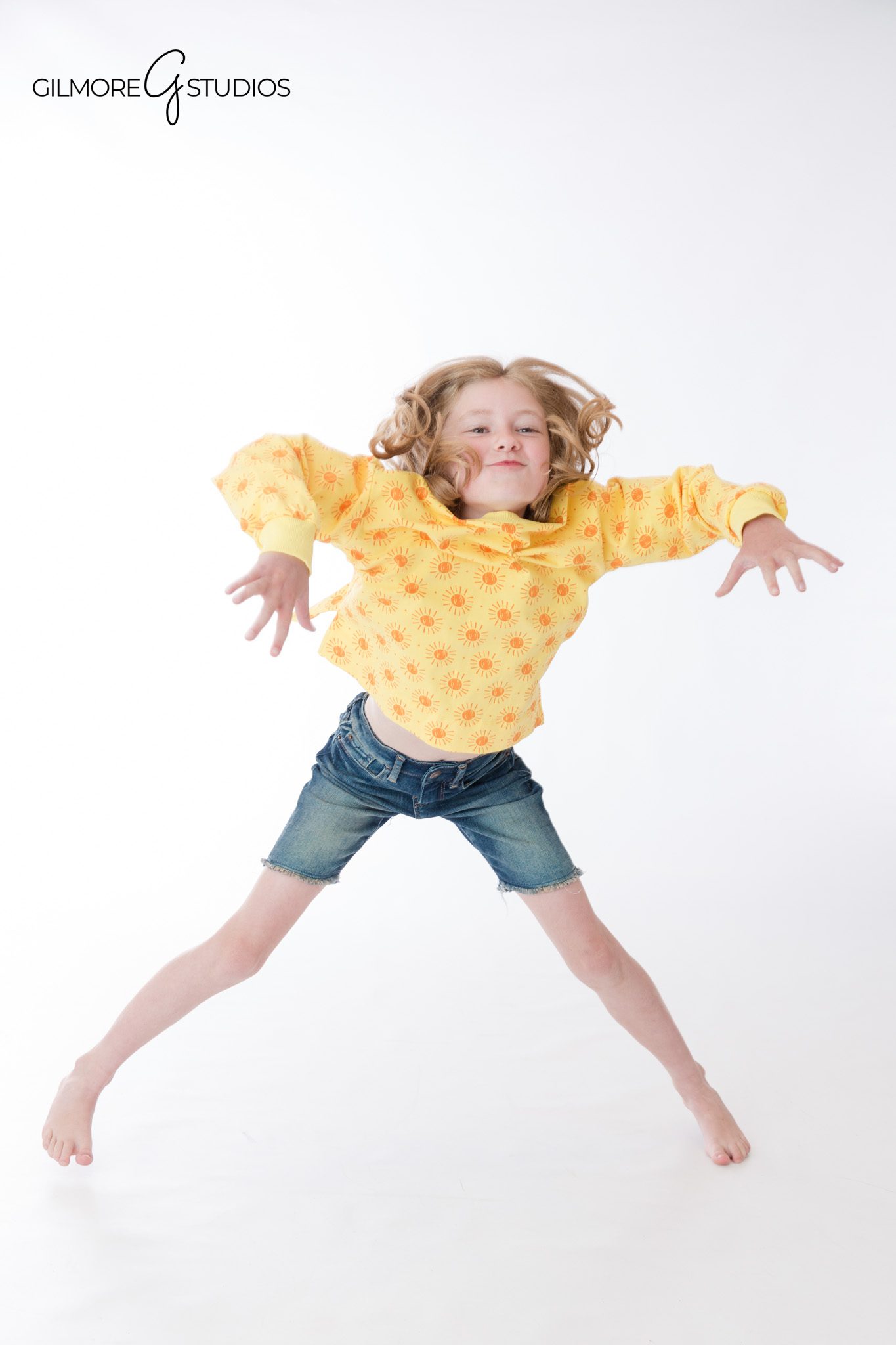 Gilmore Studios sibling portraits with a clean white studio background
Newport Beach children’s portraits with timeless studio styling