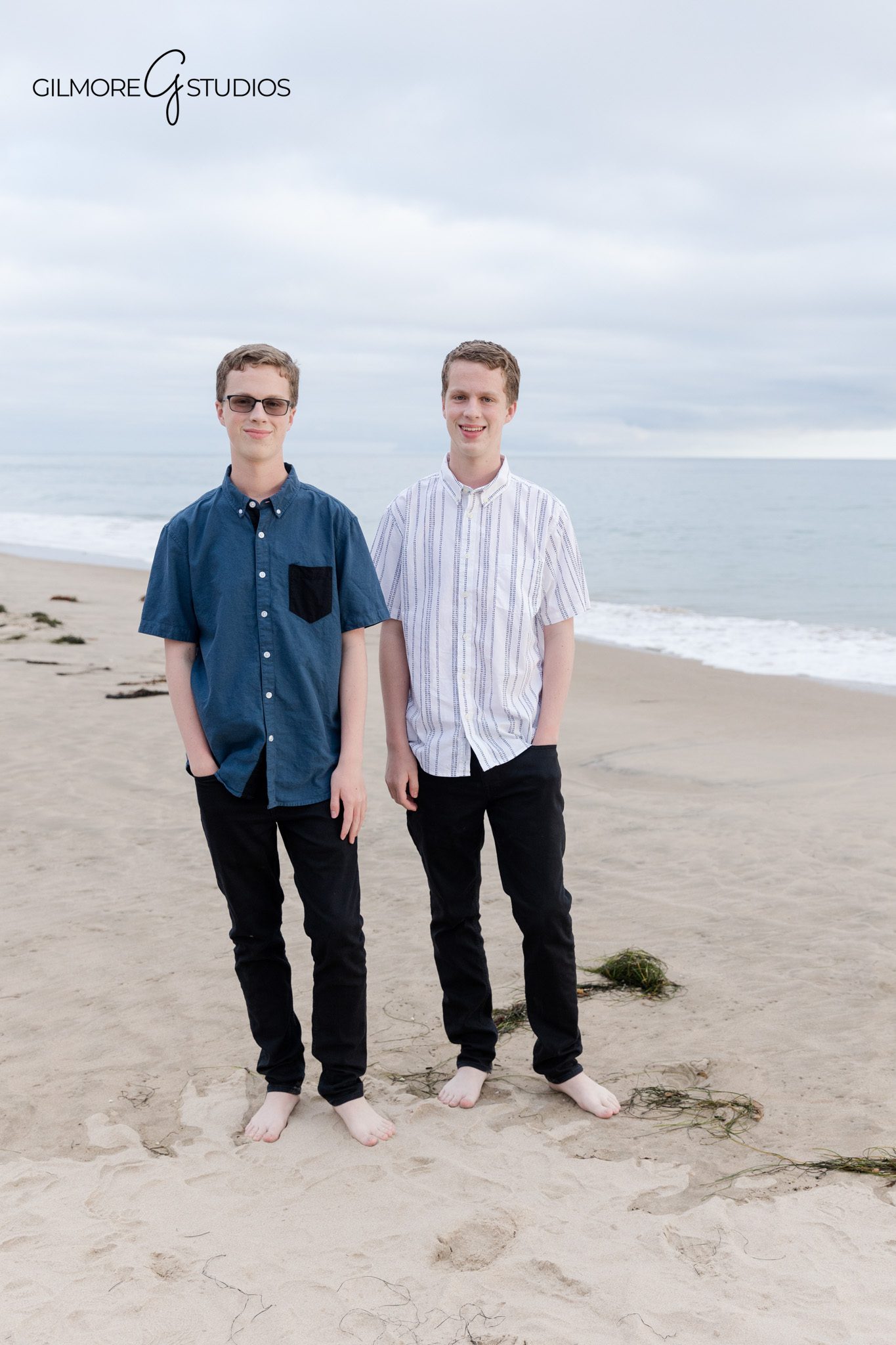 Newport Beach senior photographer capturing brothers together
Twin brothers posing together for senior portraits at the beach